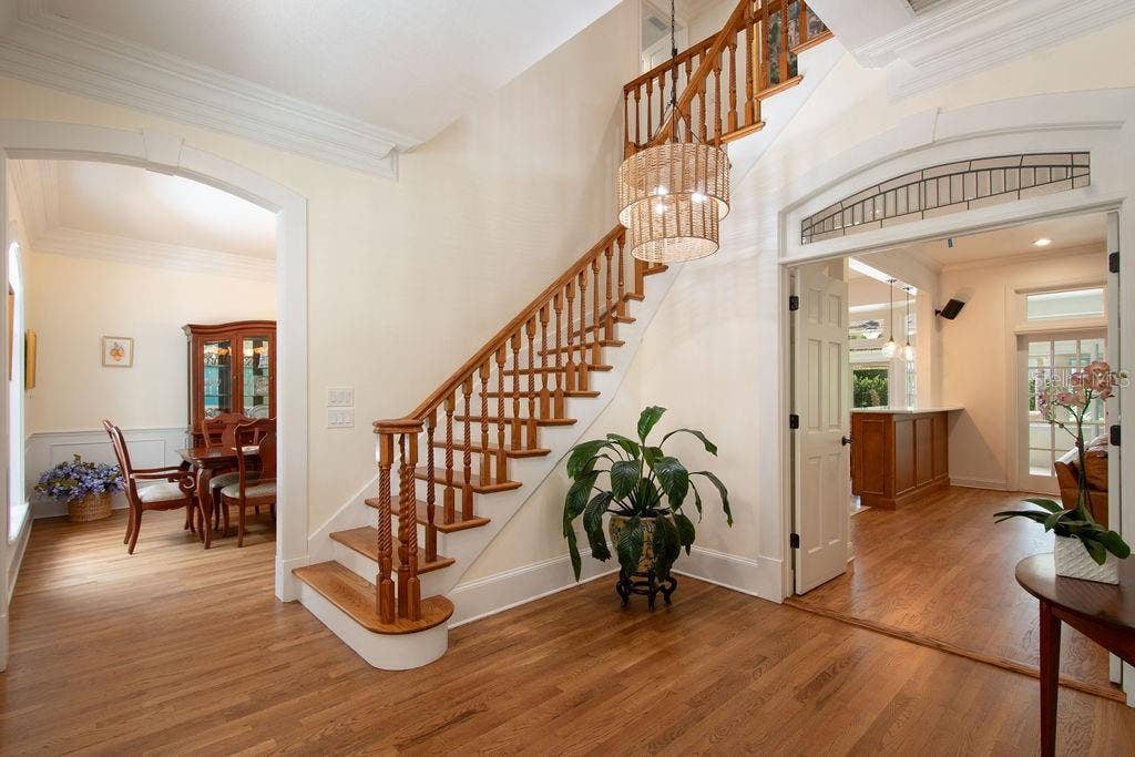 555 E LAKE SUE AVENUE, Winter Park, FL 32789 Foyer with dining room to the left, formal living room to the right.