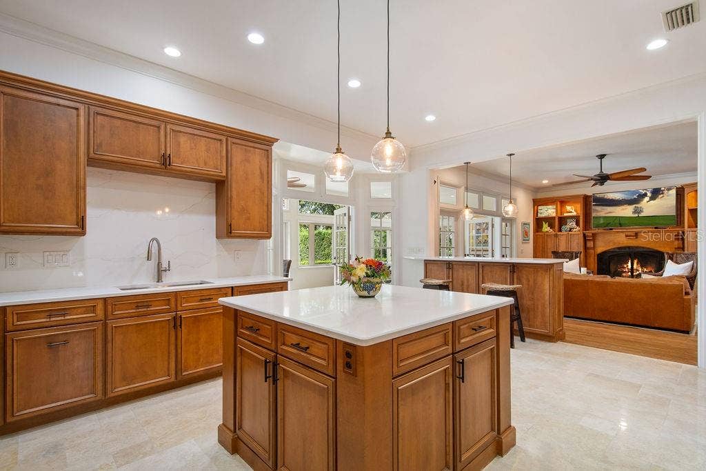 555 E LAKE SUE AVENUE, Winter Park, FL 32789 Island, with lead in to the family room