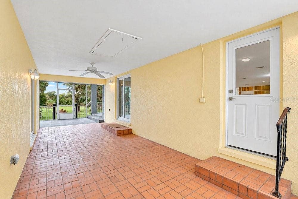 2391 BANANA STREET, Deland, FL 32720 BREEZWAY AND FRONT DOOR ENTRY