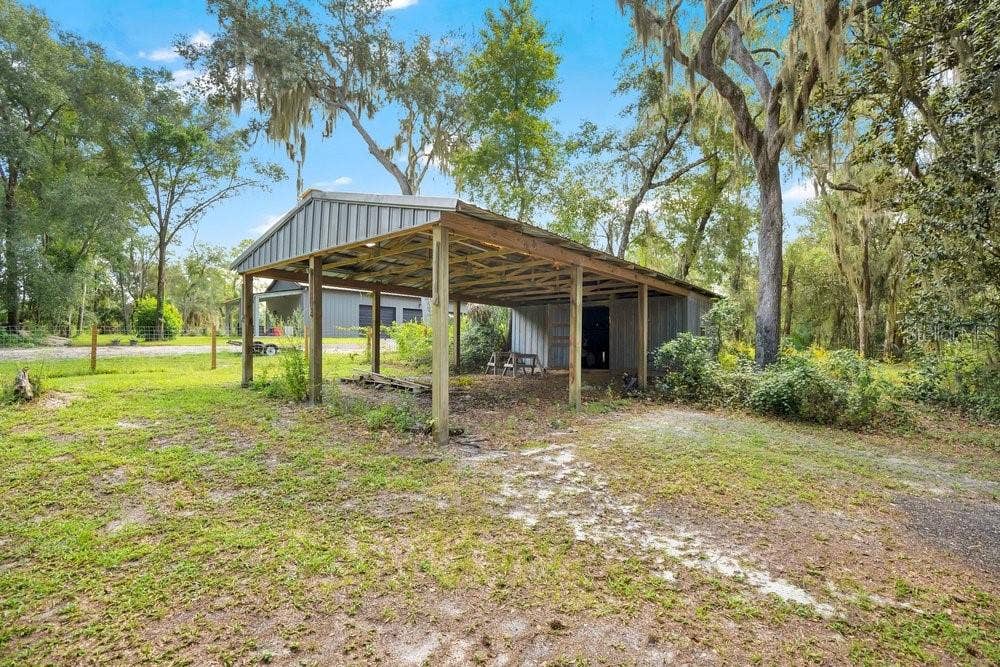 2391 BANANA STREET, Deland, FL 32720 POLE BARN WITH STORAGE
