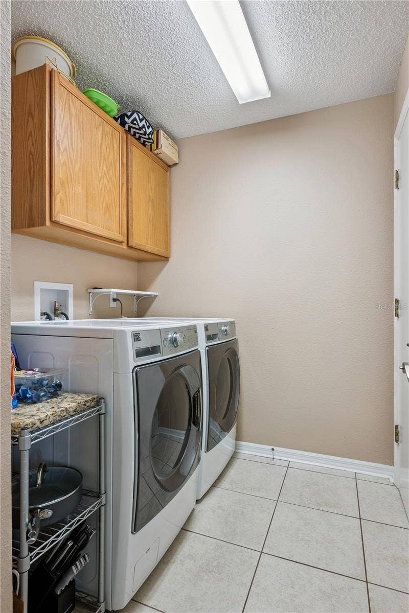 3828 BROOKMYRA DRIVE, Orlando, FL 32837 Indoor laundry room