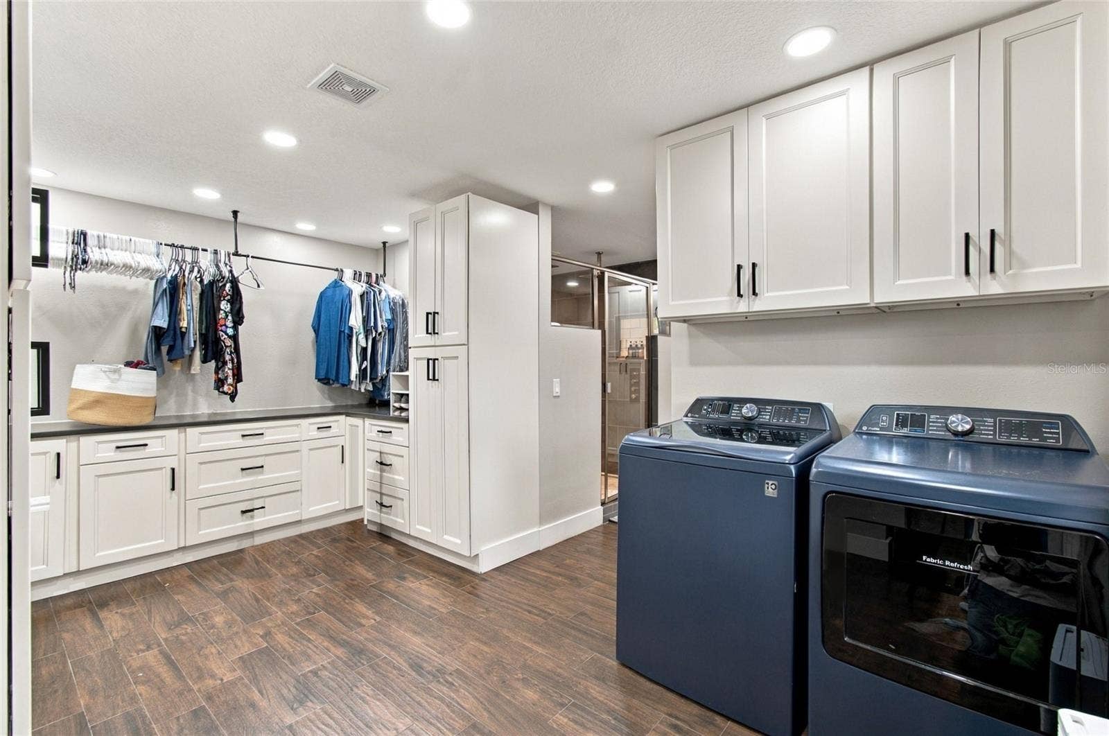 2210 EDGAR COURT, Oviedo, FL 32765 Walk-in Closet + Laundry - AI enhanced