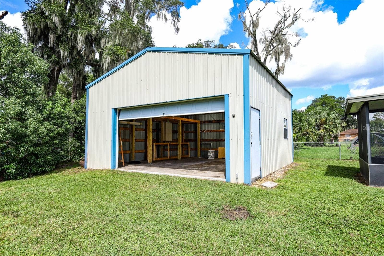 506 S ELSASSER STREET, Deland, FL 32720 2 car garage/workshop with working door