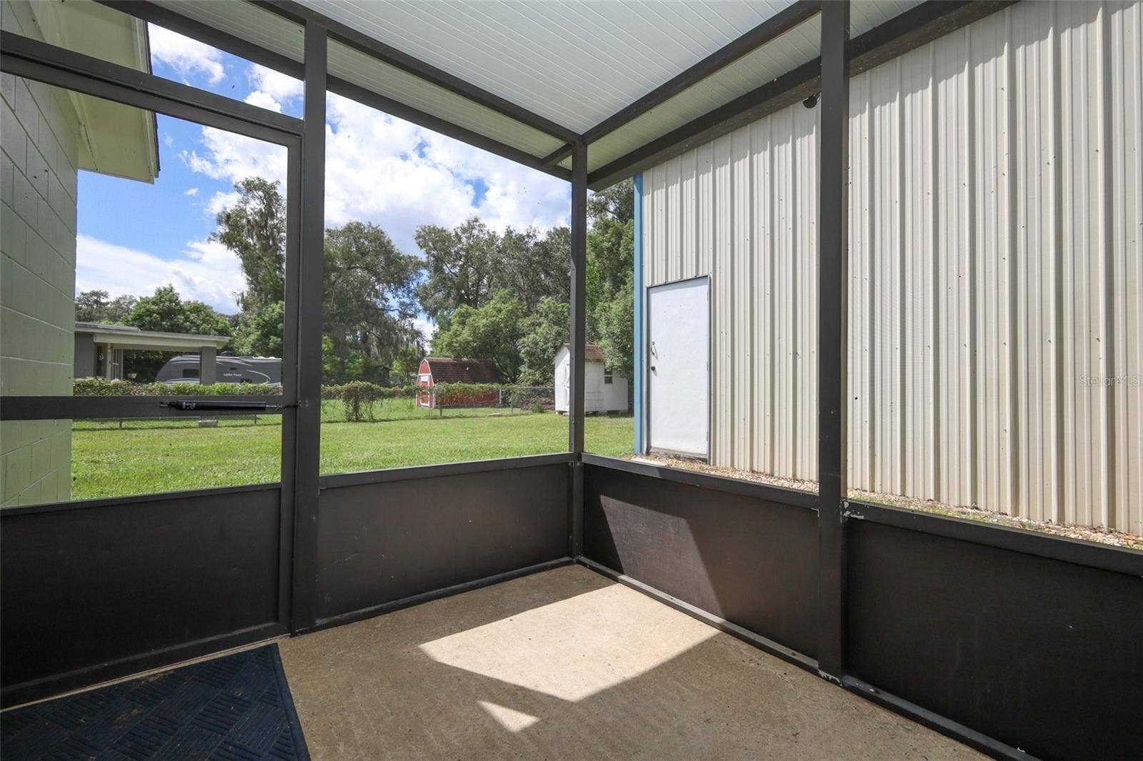 506 S ELSASSER STREET, Deland, FL 32720 Screened Patio and Yard