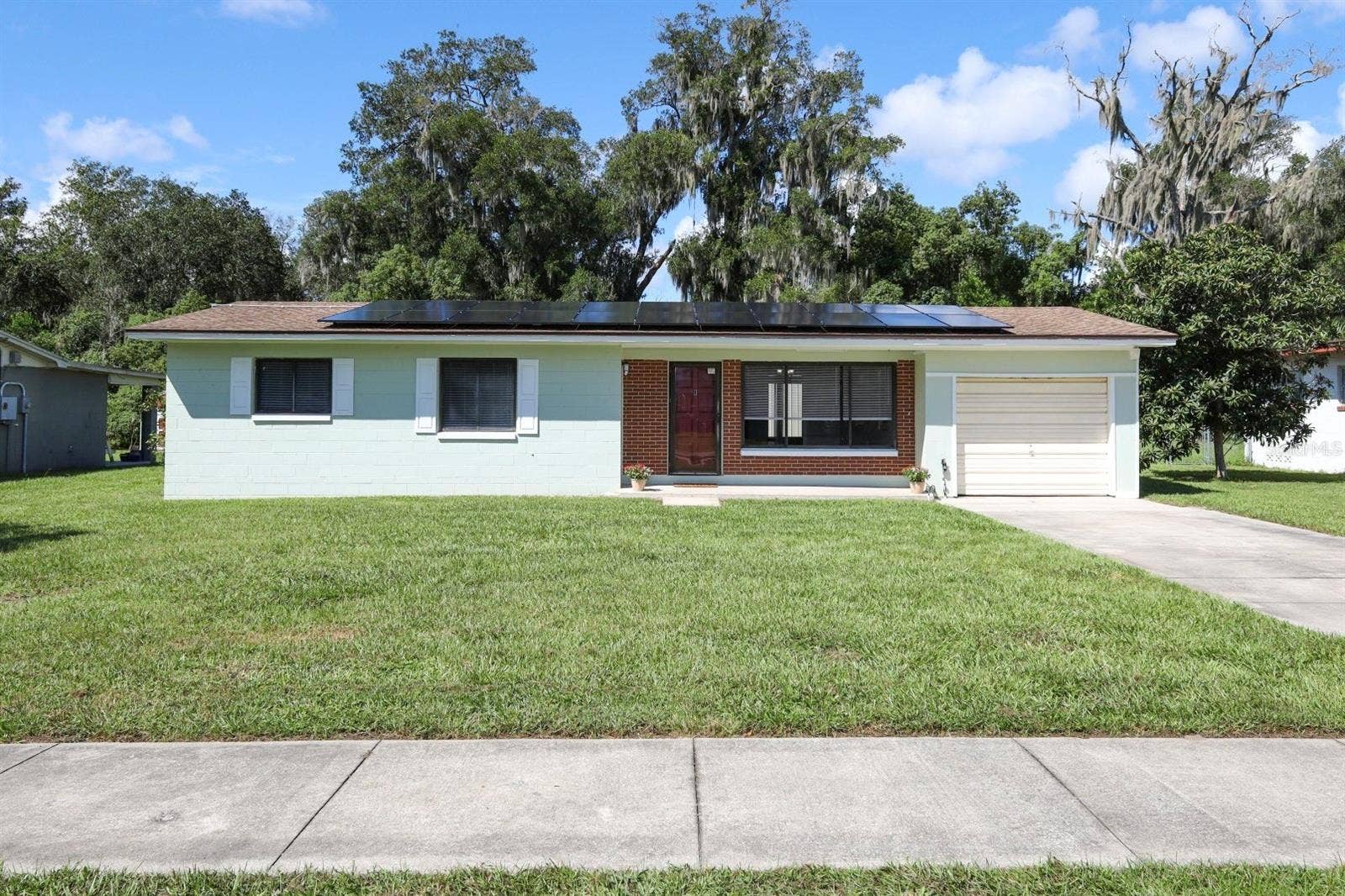506 S ELSASSER STREET, Deland, FL 32720 Front View with Sidewalks