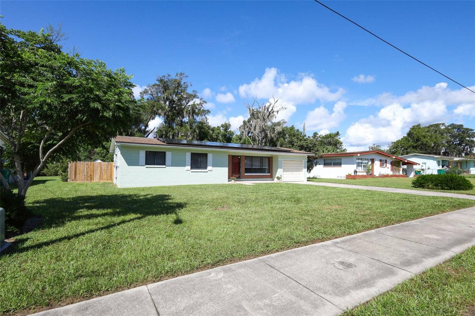 506 S ELSASSER STREET, Deland, FL 32720 Large Front Yard with Fenced Backyard