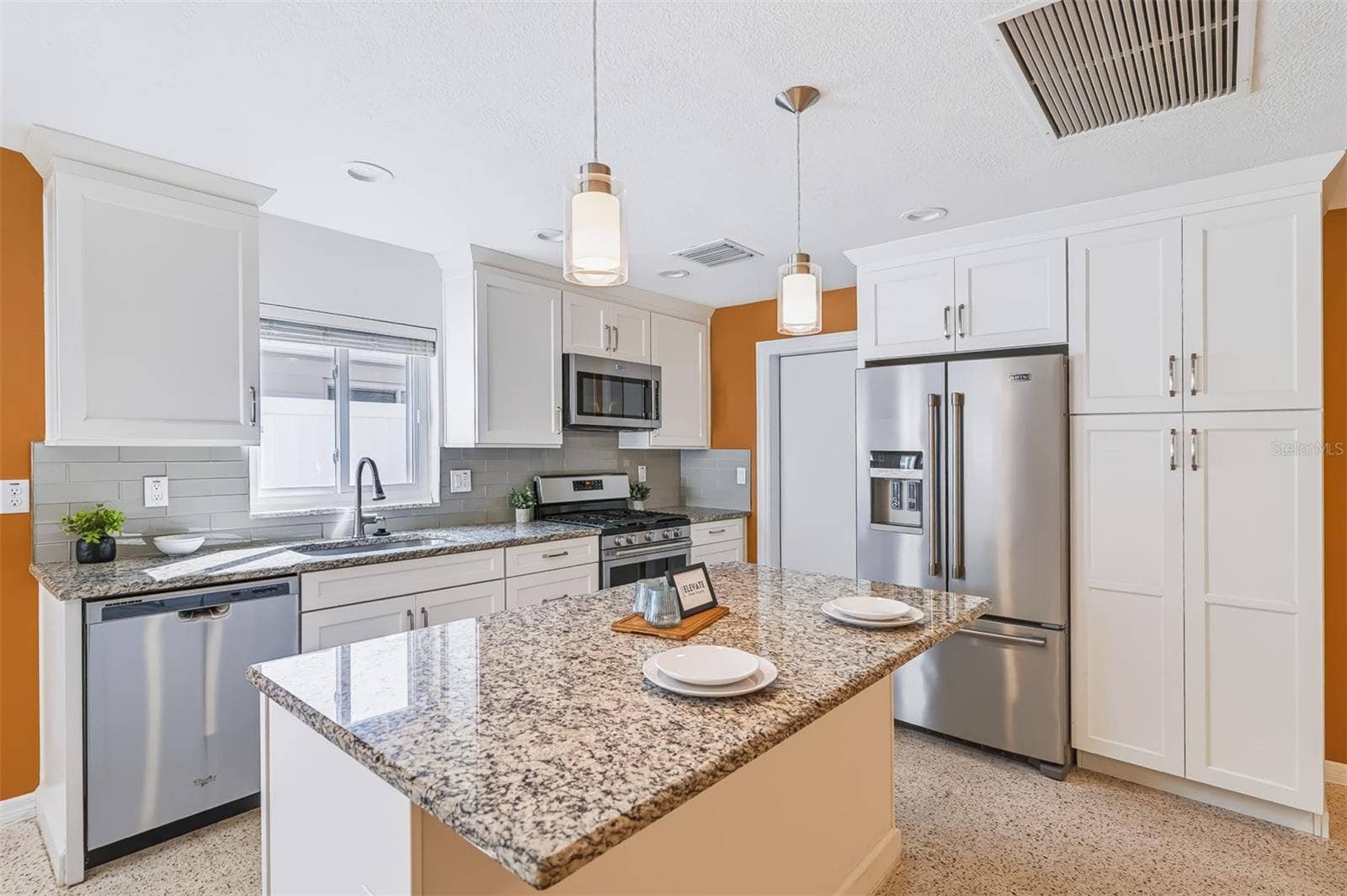 624 DUNRAVEN DRIVE, Winter Park, FL 32792 Kitchen with Granite Counters, Stainless-Steel Appliances & Soft-Close Drawers and Cabinets