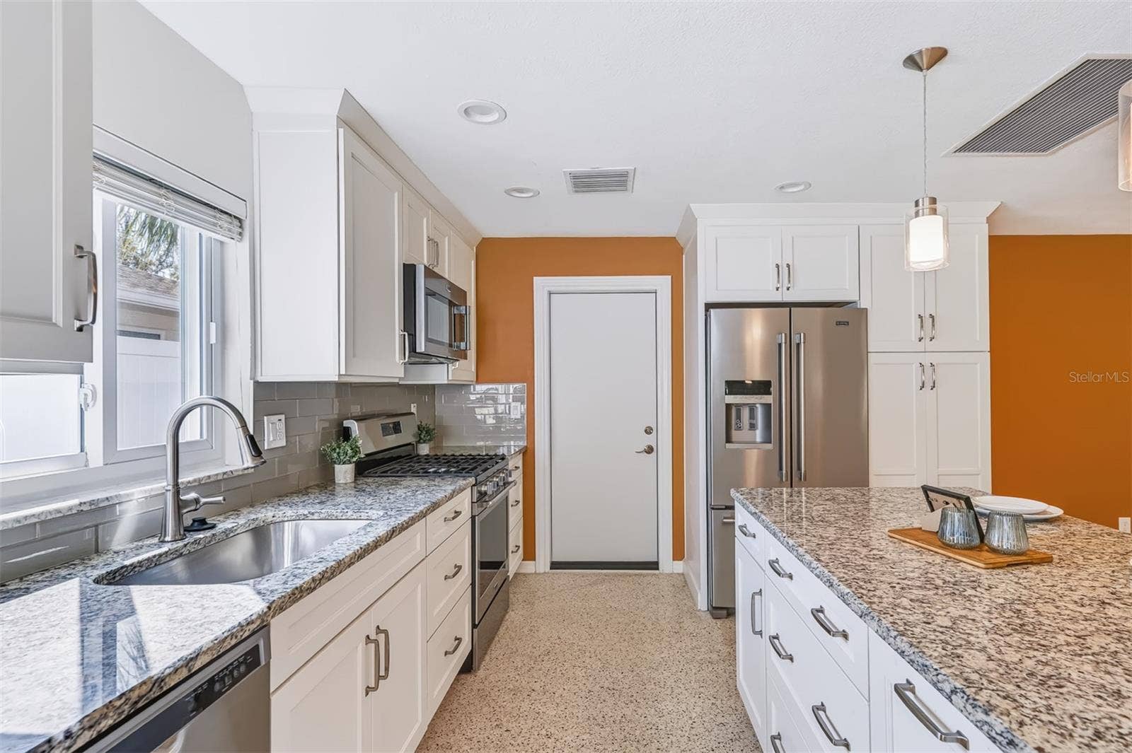 624 DUNRAVEN DRIVE, Winter Park, FL 32792 Kitchen with New Gas Range and Island with Storage & Power
