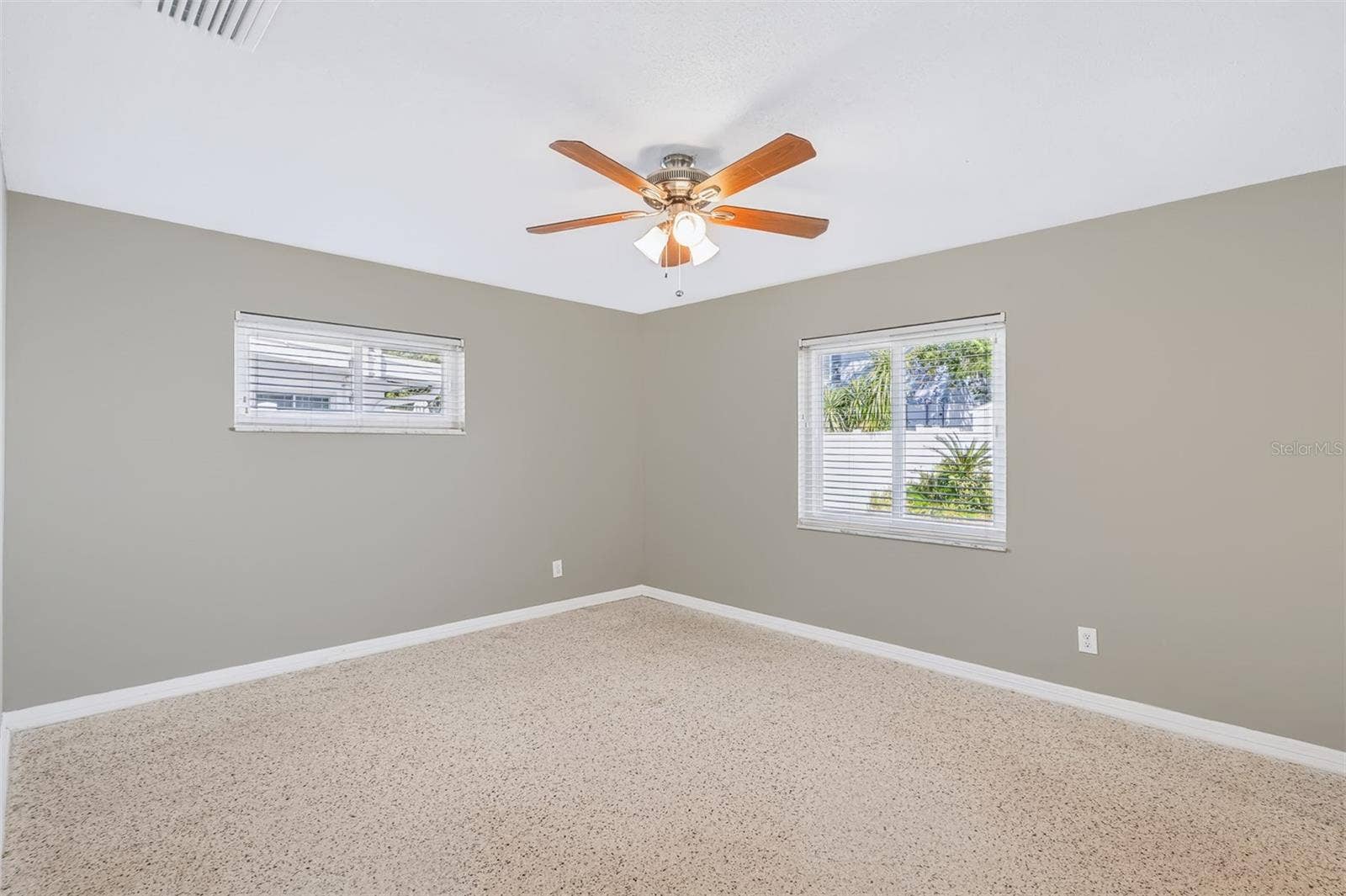 624 DUNRAVEN DRIVE, Winter Park, FL 32792 Primary Bedroom with Great Natural Light and Wonderful Terrazo Floors
