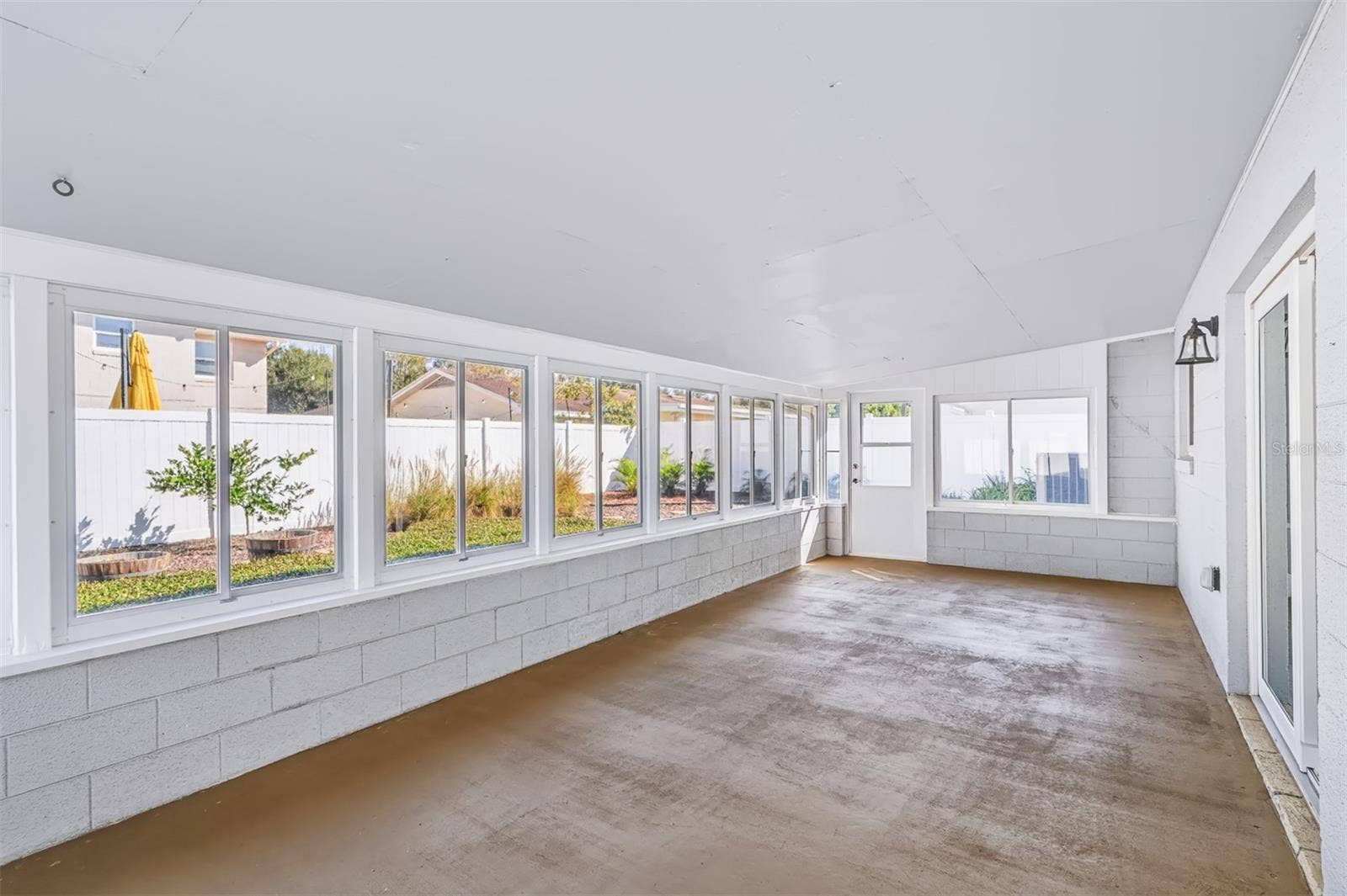 624 DUNRAVEN DRIVE, Winter Park, FL 32792 Enclosed Lanai with Windows That Wrap Around Entire Space