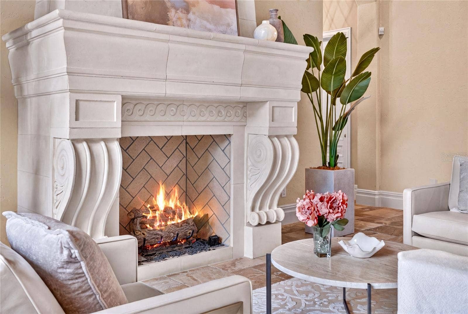 6113 GROSVENOR SHORE DRIVE, Windermere, FL 34786 Virtually staged. The living room statement fireplace is natural gas.