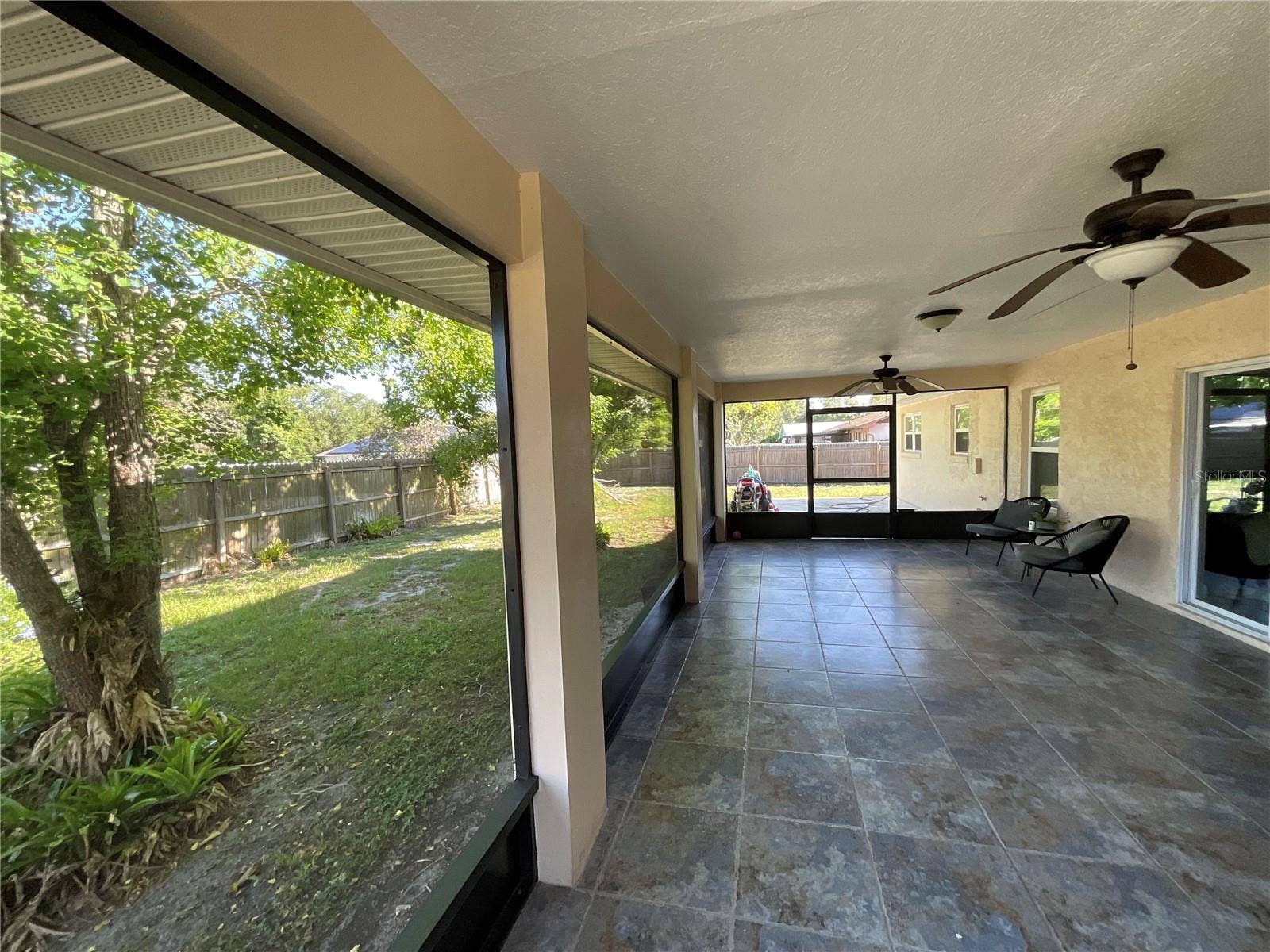 6004 HARDROCK CIRCLE, Orlando, FL 32819 BACK PORCH