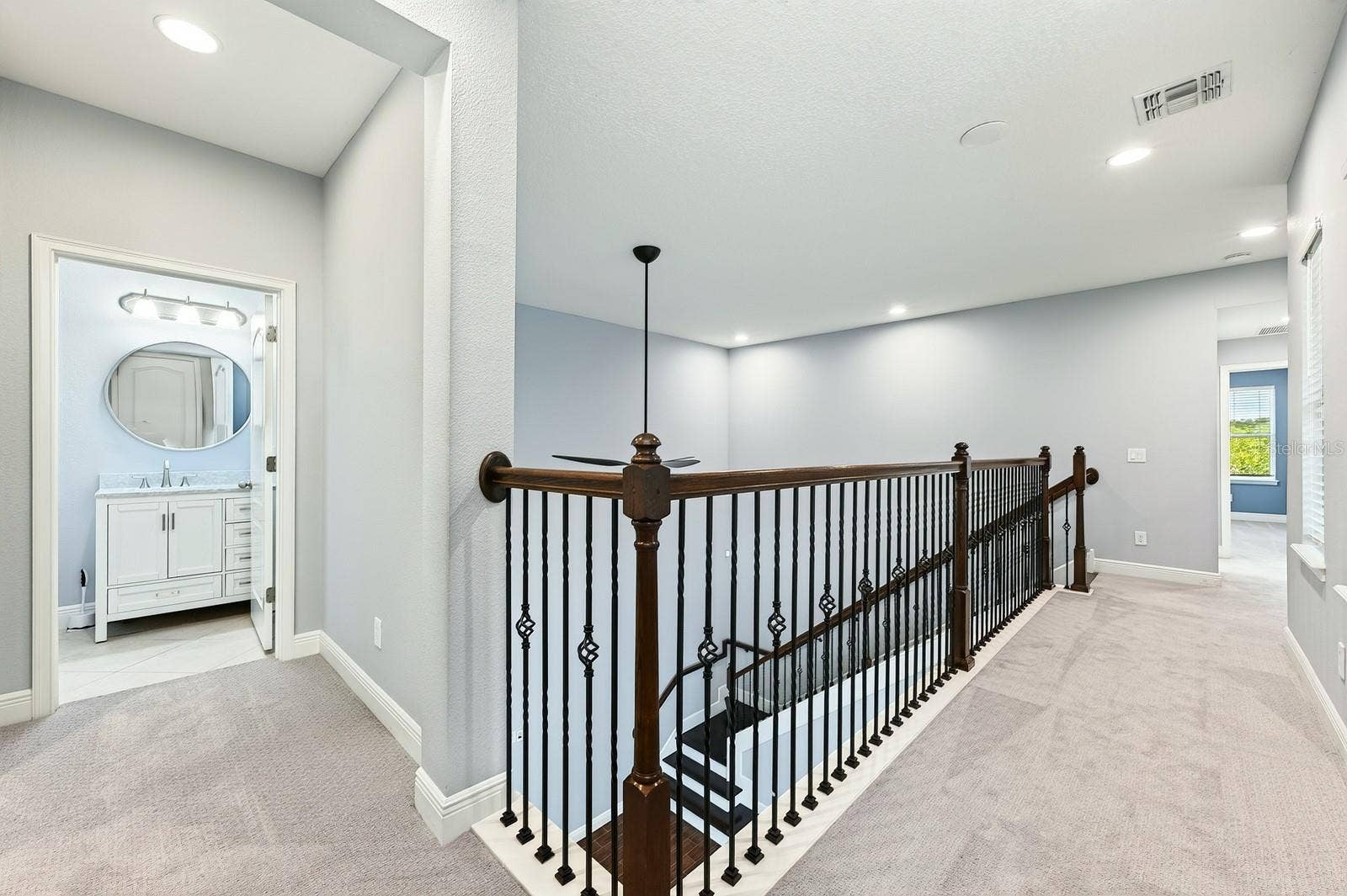 14061 WALCOTT AVENUE, Orlando, FL 32827 Second floor landing, catwalk views to the main floor.