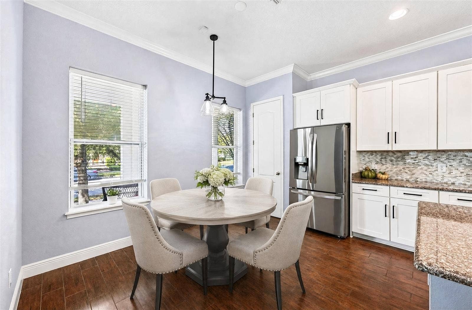 14061 WALCOTT AVENUE, Orlando, FL 32827 Casual dining space. Virtually Staged.