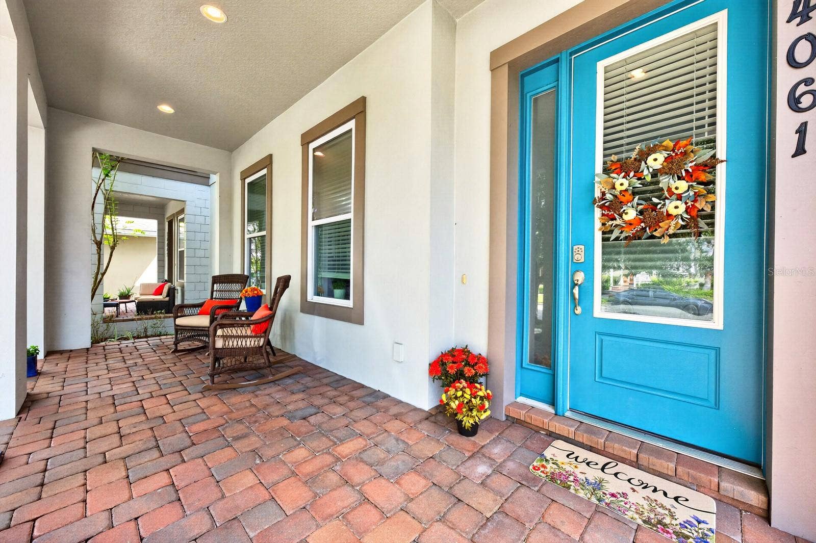 14061 WALCOTT AVENUE, Orlando, FL 32827 Charming covered front porch.