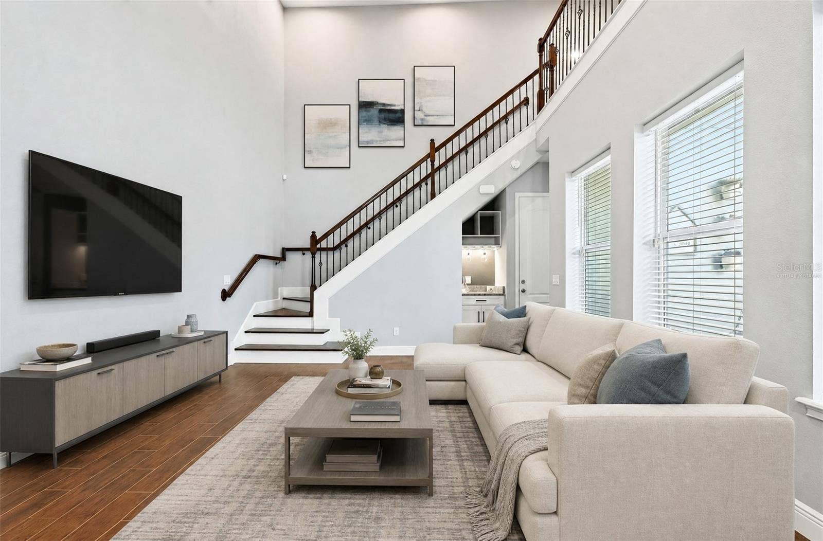 14061 WALCOTT AVENUE, Orlando, FL 32827 Light and bright two story living room. Virtually Staged.