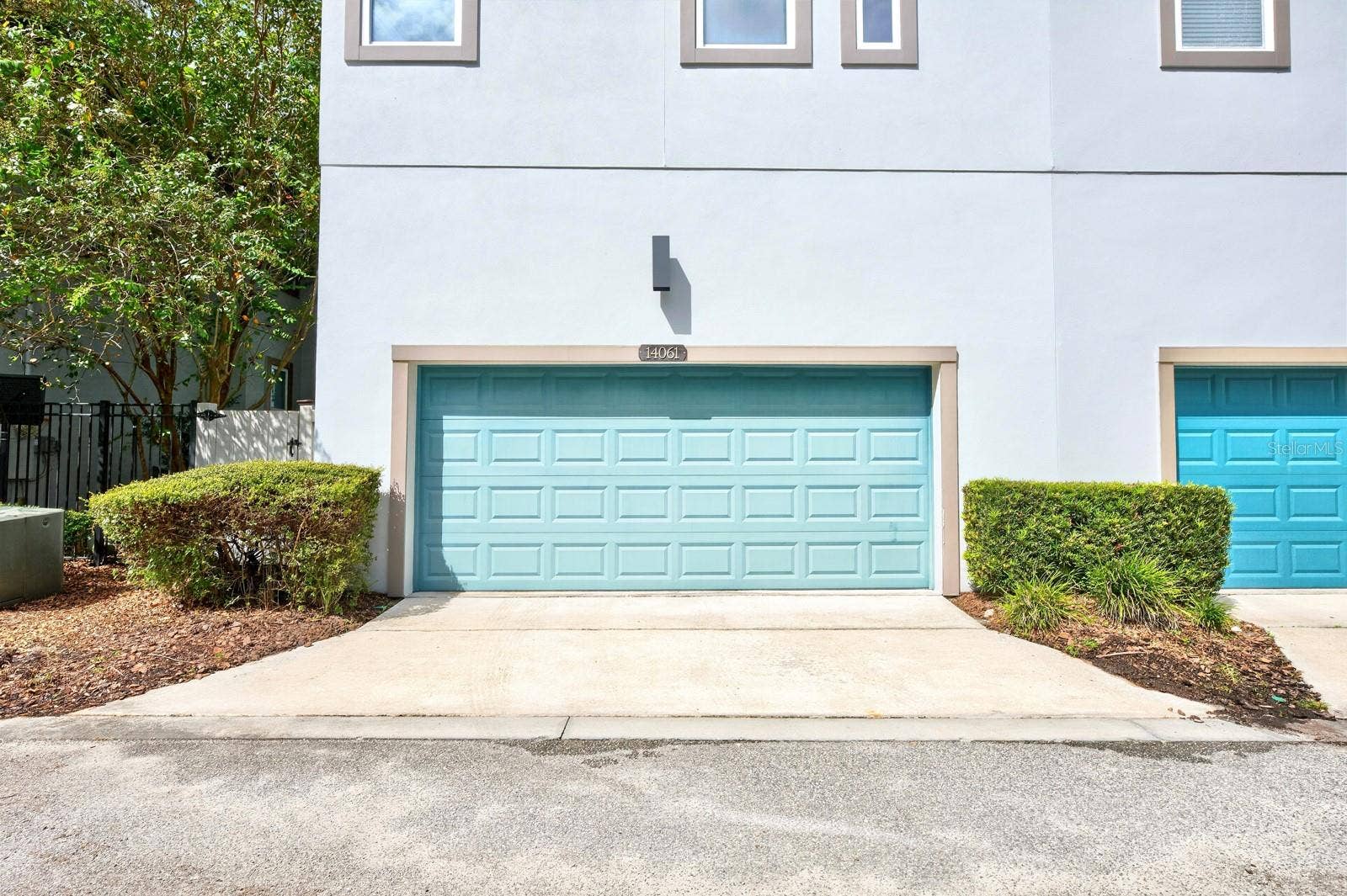 14061 WALCOTT AVENUE, Orlando, FL 32827 2-car rear facing garage.