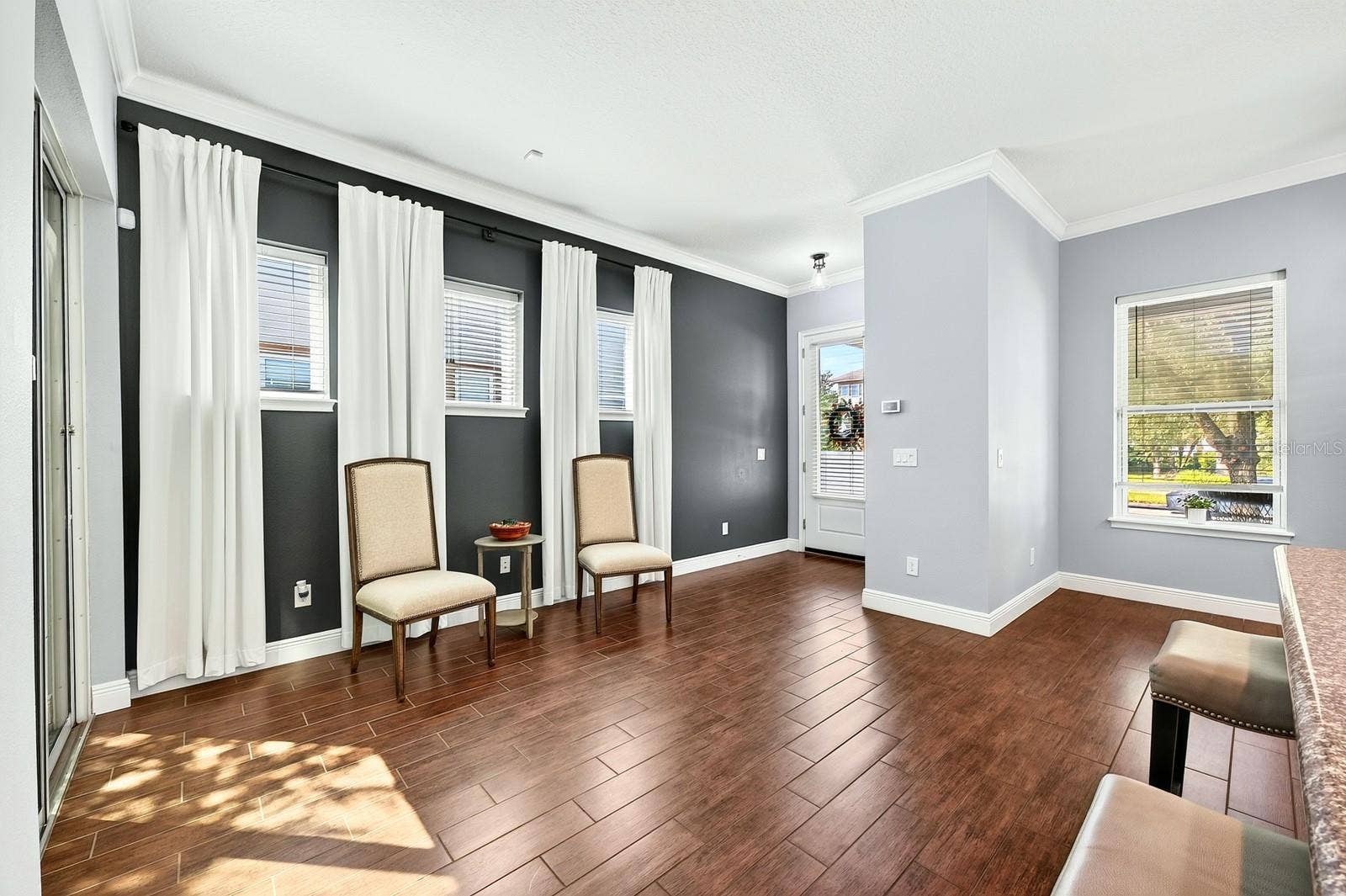 14061 WALCOTT AVENUE, Orlando, FL 32827 Many windows let the natural light pour in.