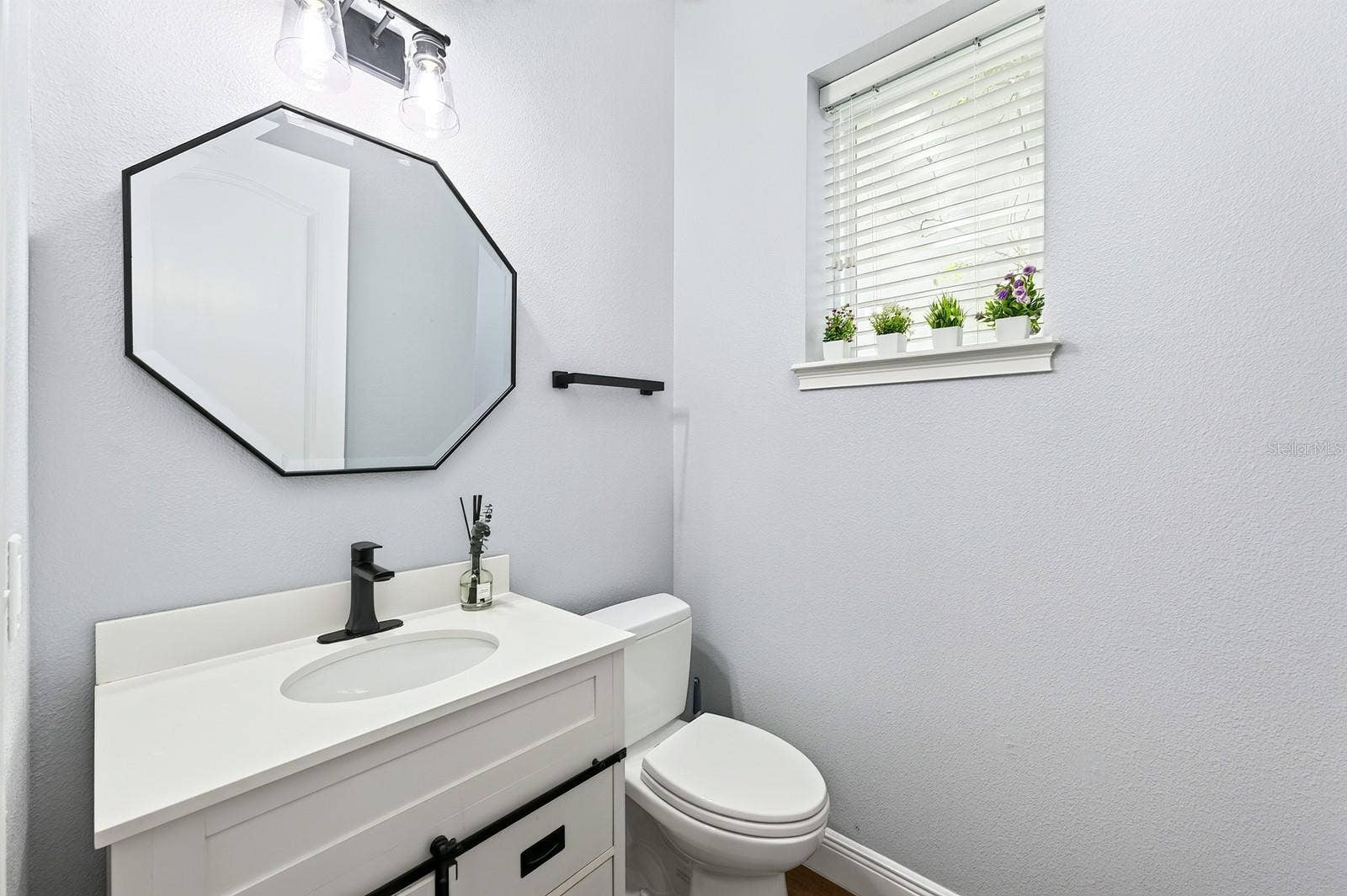 14061 WALCOTT AVENUE, Orlando, FL 32827 Main floor powder room.