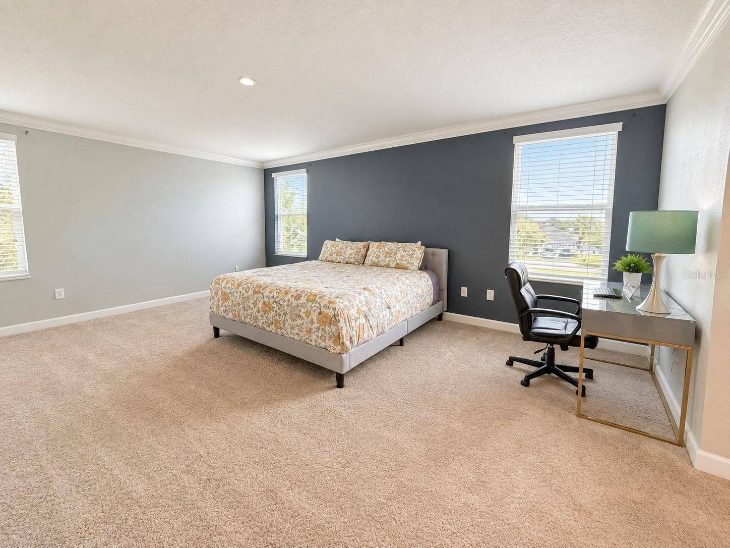 1516 BUNKER DRIVE, Davenport, FL 33896 Generously sized primary suite with ample space for a complete bedroom retreat.