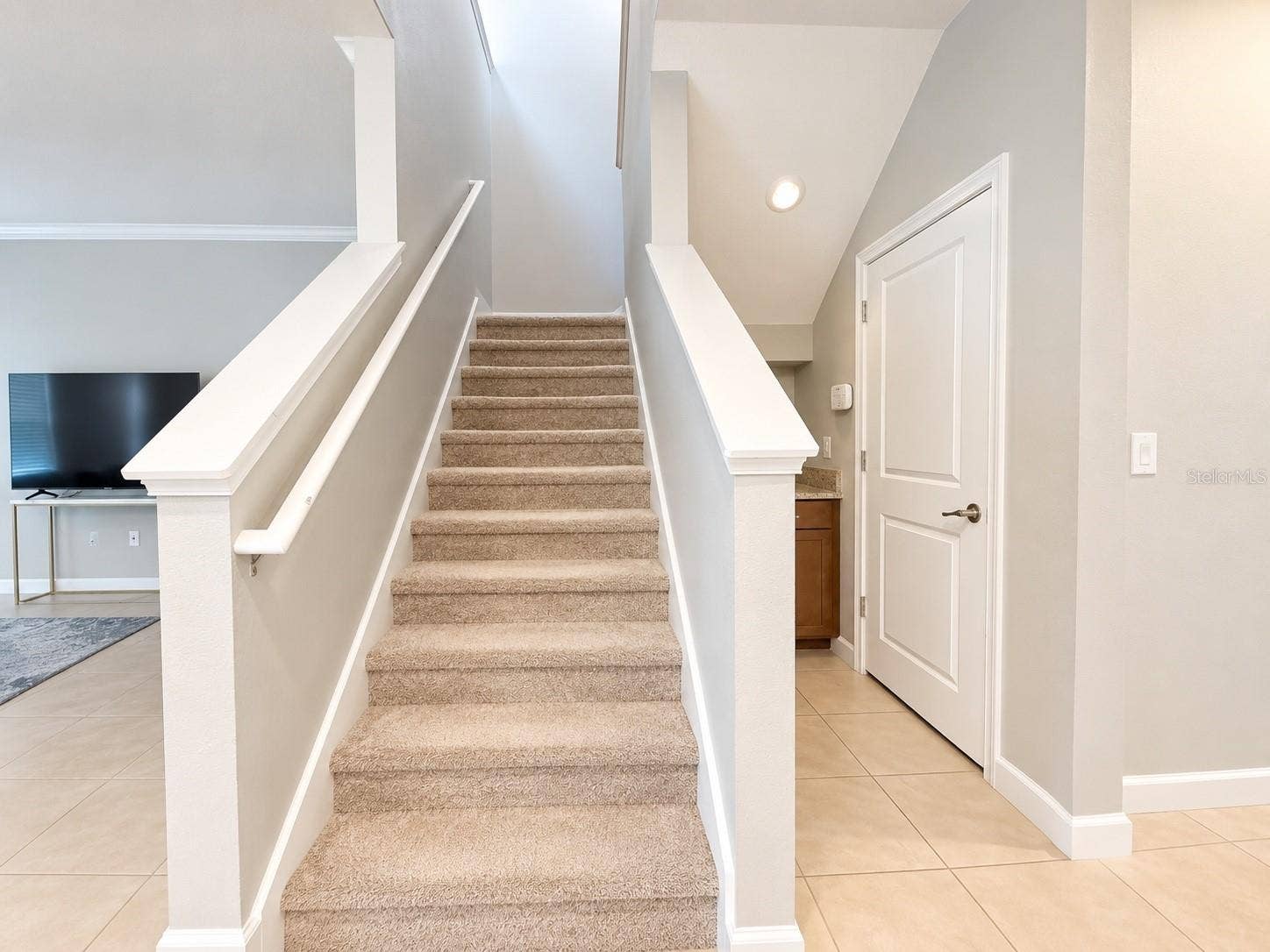 1516 BUNKER DRIVE, Davenport, FL 33896 Carpeted stairway