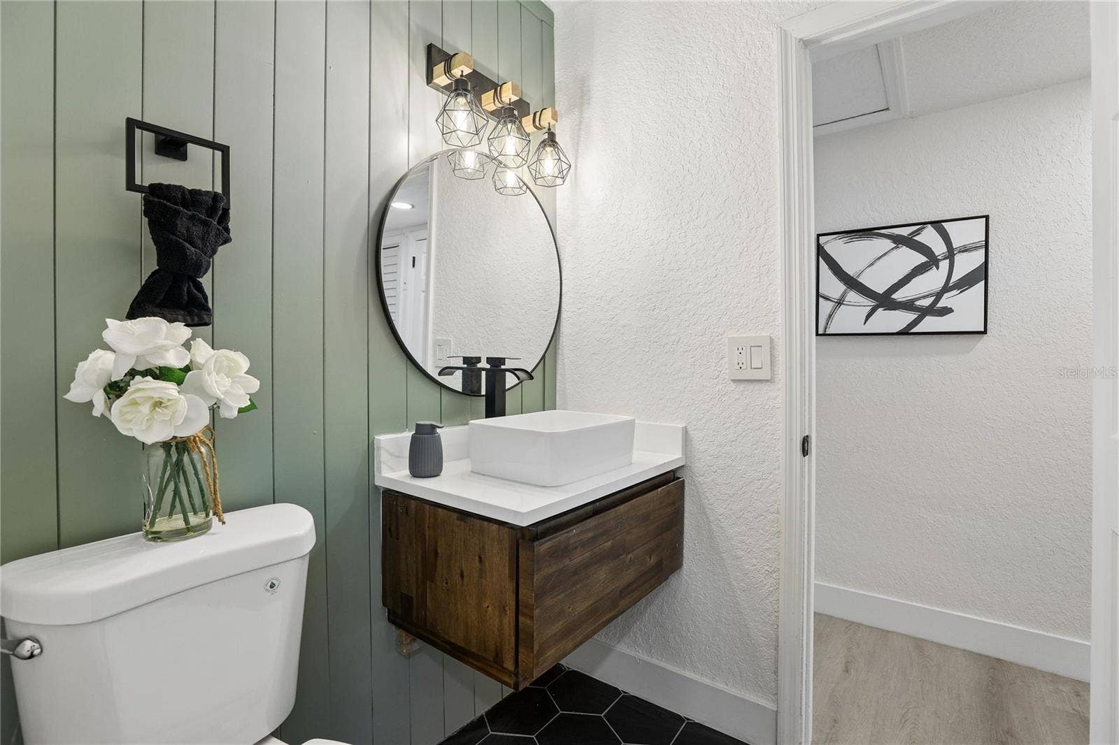 1718 CAMPBELL AVENUE, Orlando, FL 32806 Beautifully redesigned second full bathroom with warm wood accents