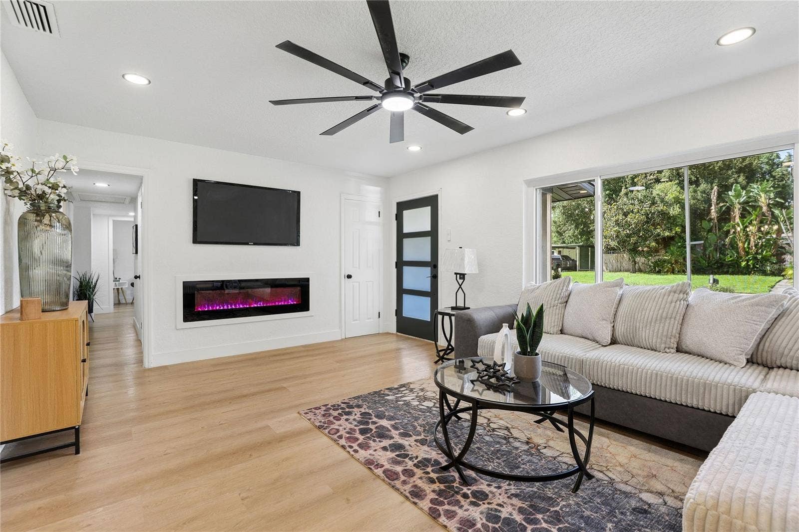 1718 CAMPBELL AVENUE, Orlando, FL 32806 Bright open-concept living with recessed lighting and modern finishes