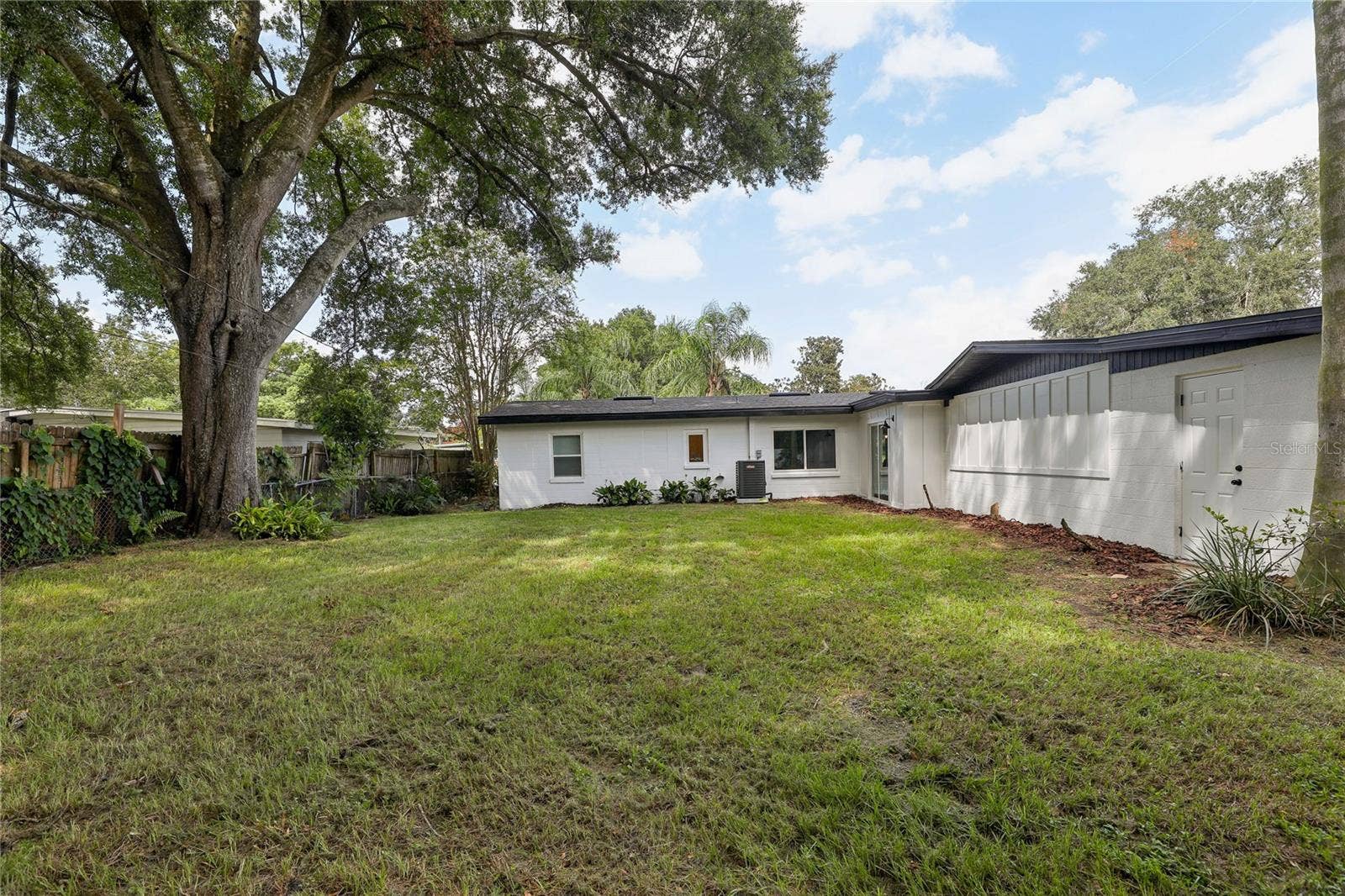 1718 CAMPBELL AVENUE, Orlando, FL 32806 HUGE backyard with mature trees and plenty of room to enjoy the Florida lifestyle