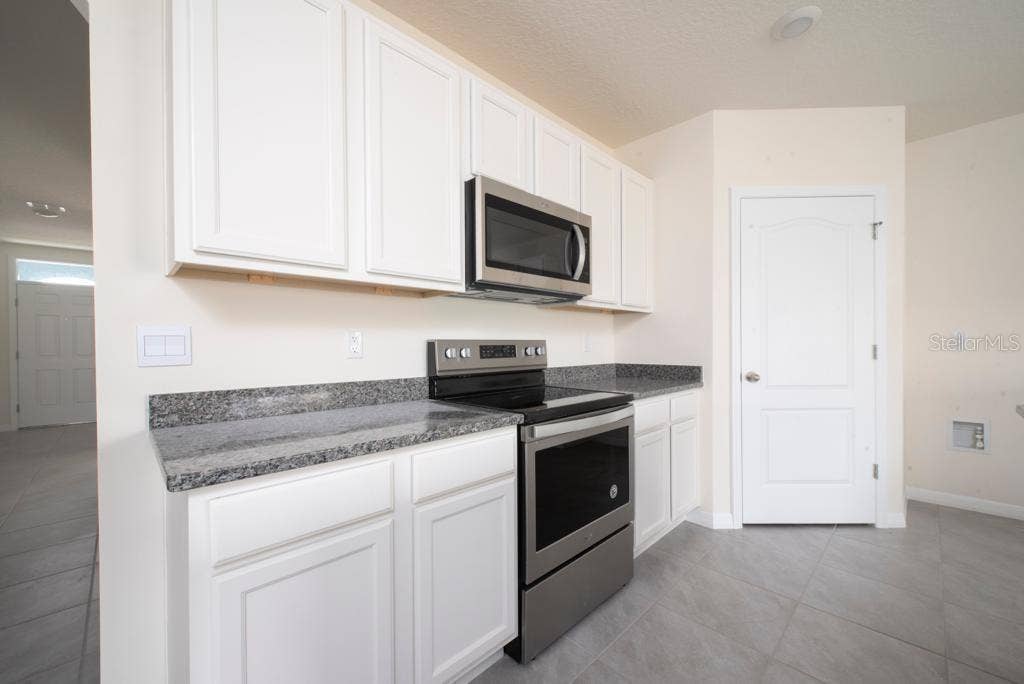 2723 SUNKISSED DRIVE, St Cloud, FL 34771 Kitchen view 2