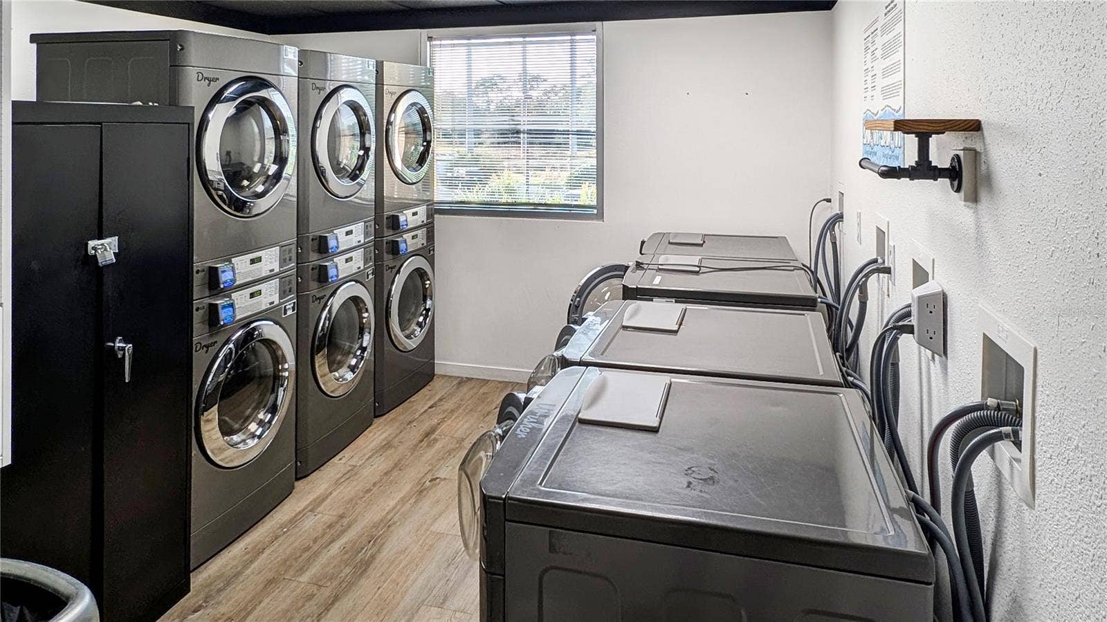 225 CELEBRATION PLACE, #212, Kissimmee, FL 34747 Community Laundry Room only a 10 Second Walk from Your Home's Front Door!