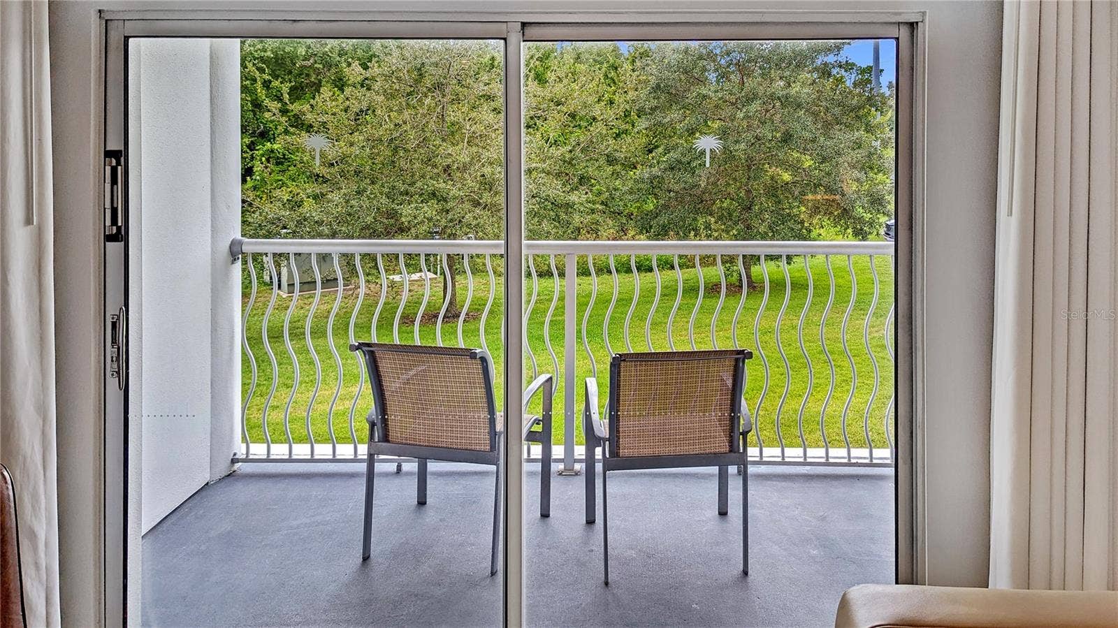 225 CELEBRATION PLACE, #212, Kissimmee, FL 34747 Your Actual Unit's View of Conservation Area! Nice!