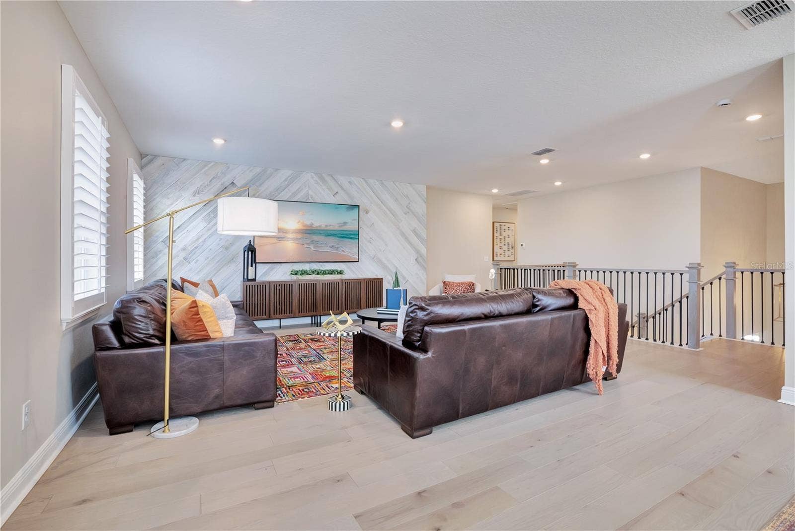 17600 LAKE STAR ROAD, Winter Garden, FL 34787 Upstairs gathering space offers generous room for comfortable seating and movie nights.