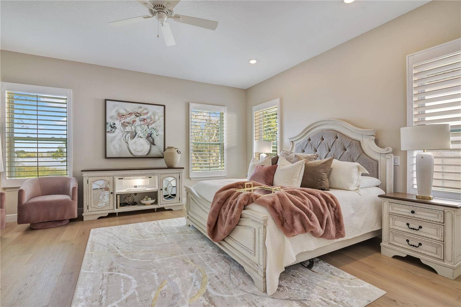 17600 LAKE STAR ROAD, Winter Garden, FL 34787 Beautifully appointed master with hardwood flooring, recessed lighting and a ceiling fan for added comfort.