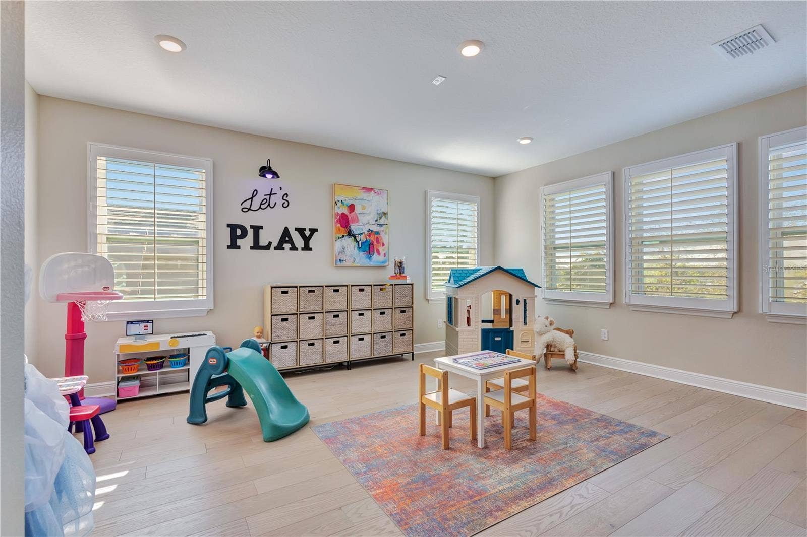 17600 LAKE STAR ROAD, Winter Garden, FL 34787 Bright play area within the upstairs loft offers flexible space for recreation, hobbies or study.