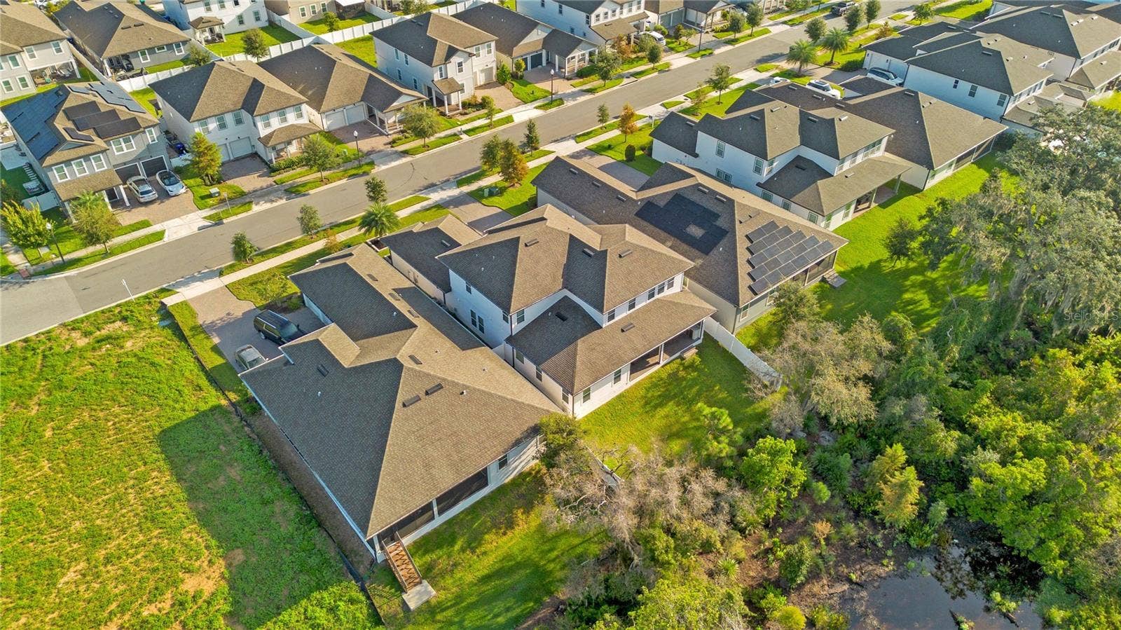17600 LAKE STAR ROAD, Winter Garden, FL 34787 Wide aerial perspective shows the propertys location within the surrounding neighborhood.