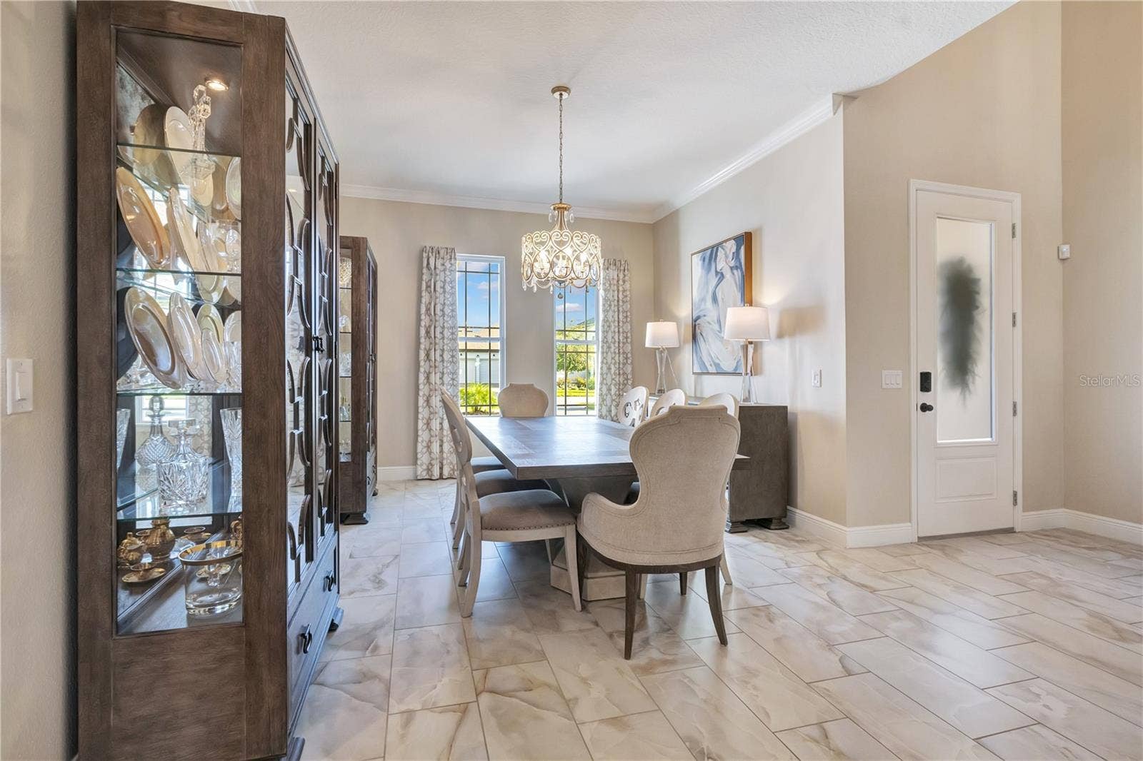 17600 LAKE STAR ROAD, Winter Garden, FL 34787 Spacious dining area with natural light and convenient access to the adjoining kitchen.