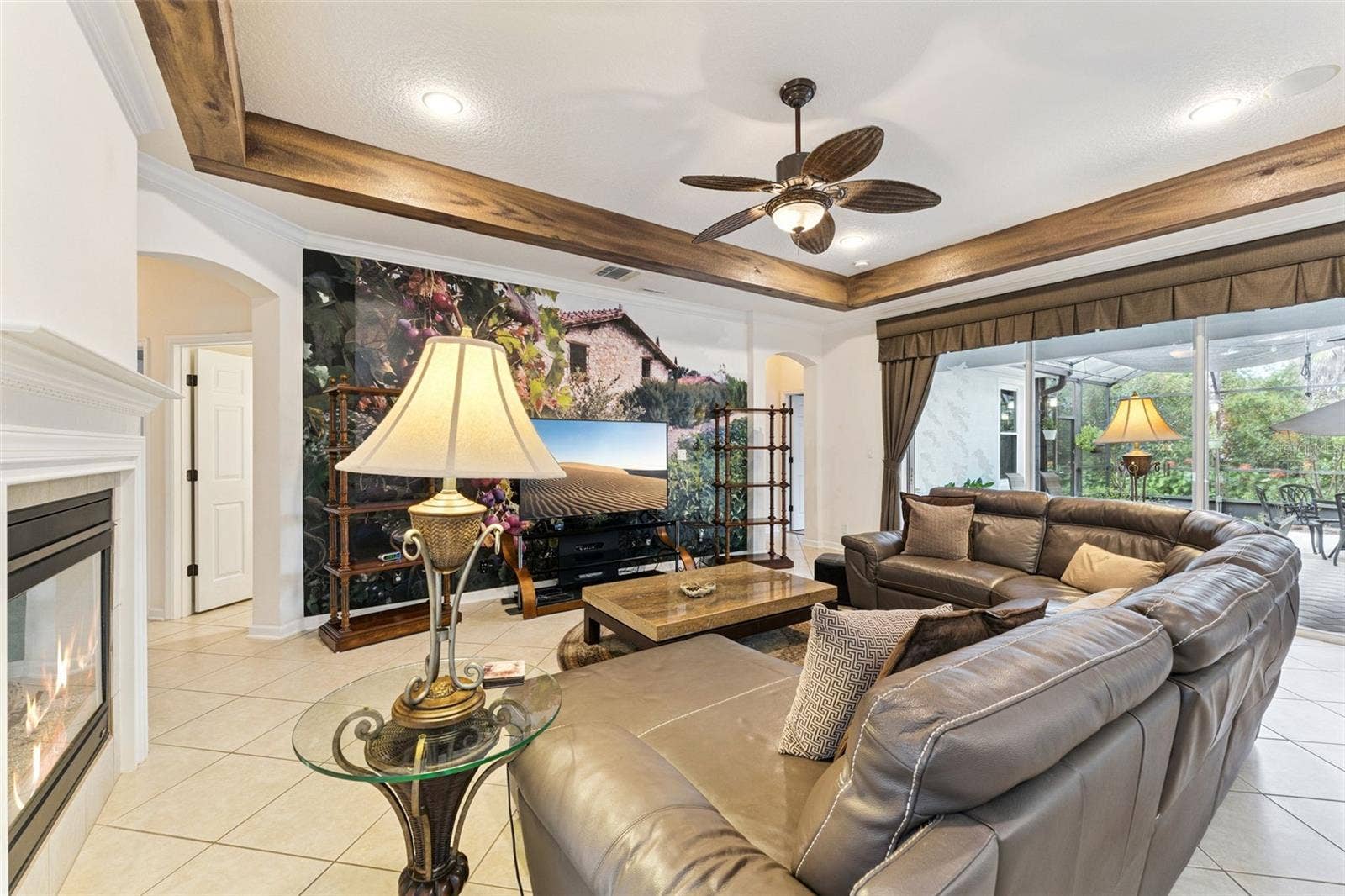 108 AVENHAM DRIVE, Deland, FL 32724 17' x 21' Family Room w/ recessed lighting, tray ceiling w/ painted border, ceiling fan & electric floor outlet