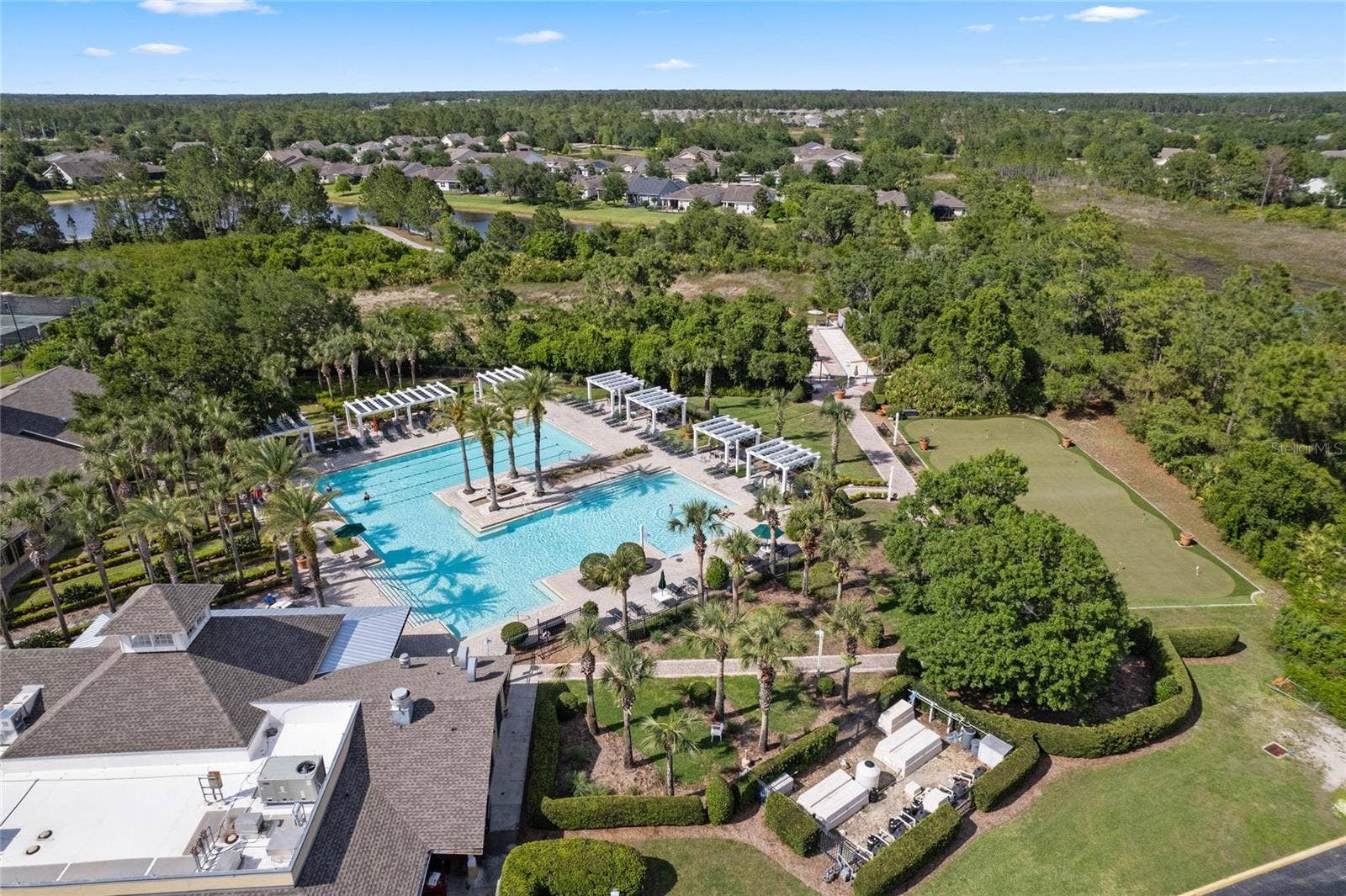 108 AVENHAM DRIVE, Deland, FL 32724 Aerial view of the Victoria Gardens resort style heated pool, putting green & bocce ball courts