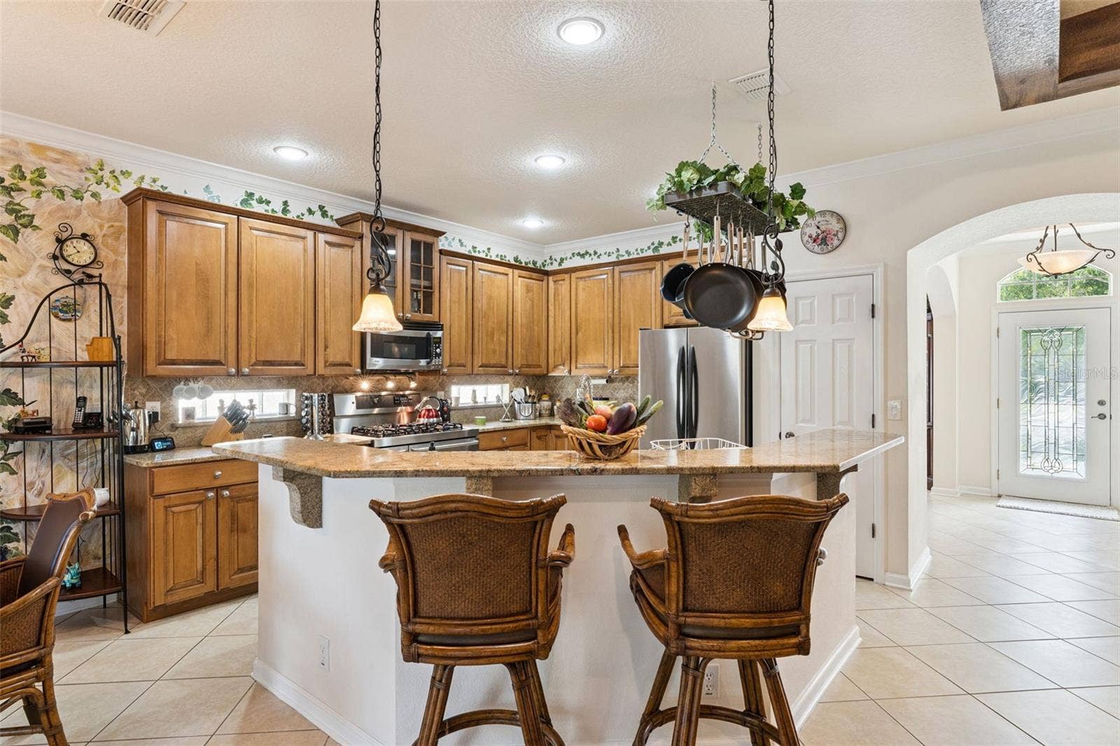 108 AVENHAM DRIVE, Deland, FL 32724 View of the Kitchen & breakfast bar w/ pendant lights above