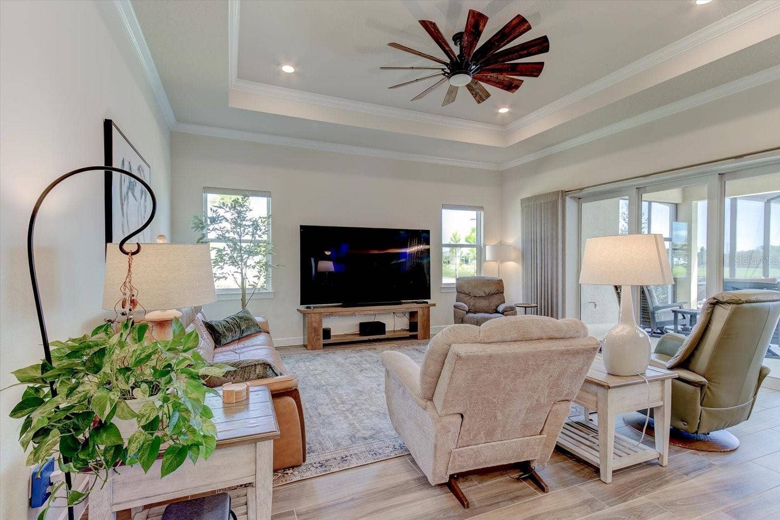 9177 SPLASHING DRIVE, Melbourne, FL 32940 Great Room with Zero Corner Sliders