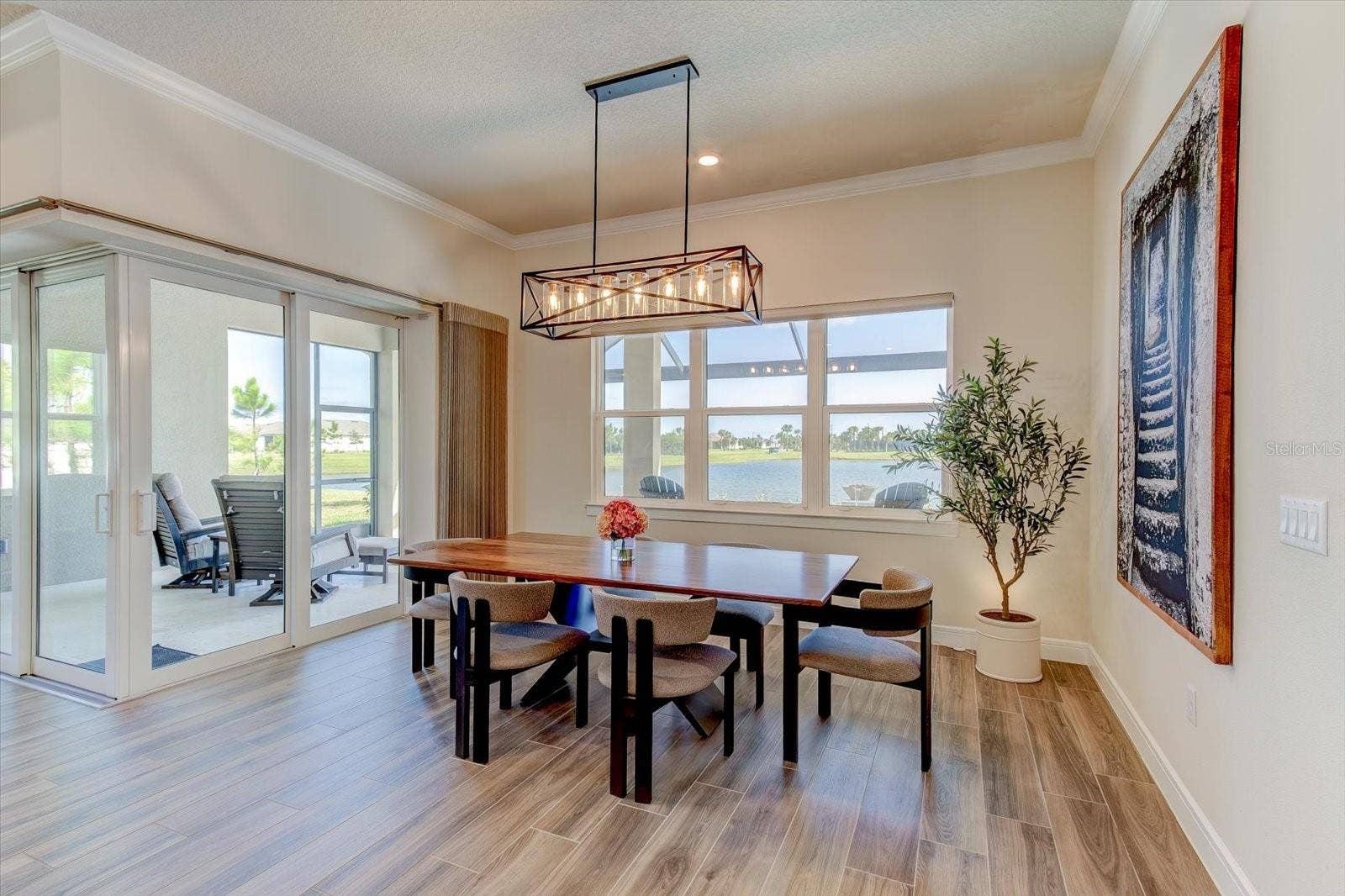 9177 SPLASHING DRIVE, Melbourne, FL 32940 Dining Area with a Water View