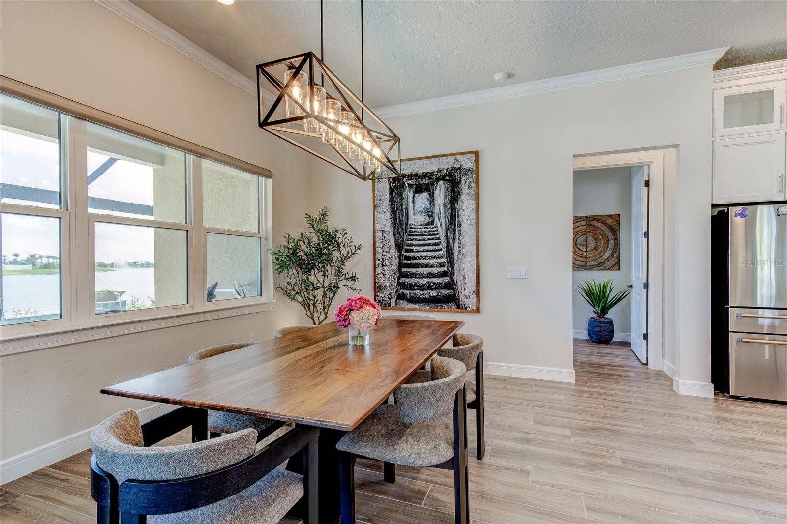 9177 SPLASHING DRIVE, Melbourne, FL 32940 Dining Area leading to Primary Suite