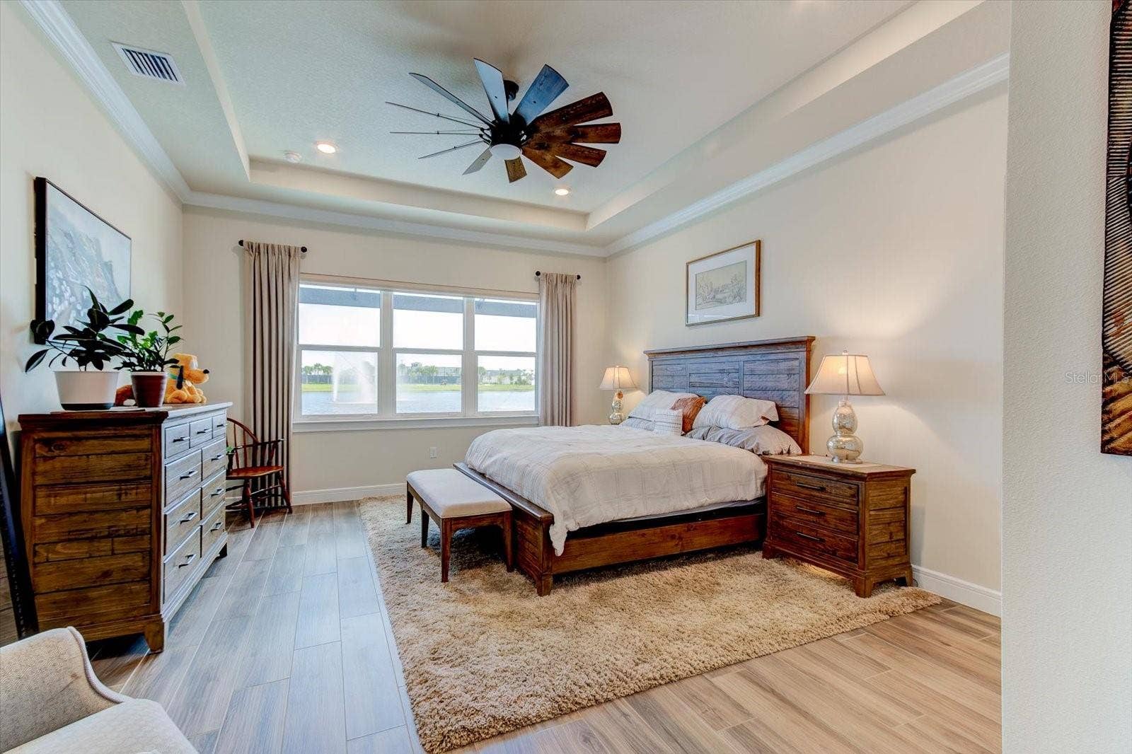9177 SPLASHING DRIVE, Melbourne, FL 32940 Primary Bedroom with a Water View
