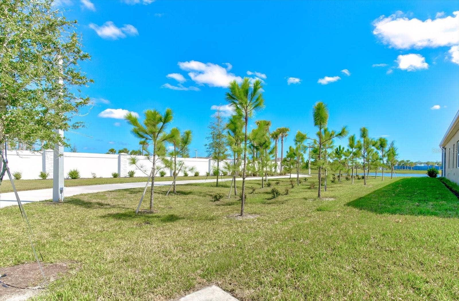 9177 SPLASHING DRIVE, Melbourne, FL 32940 Sidewalk alongside the dog park