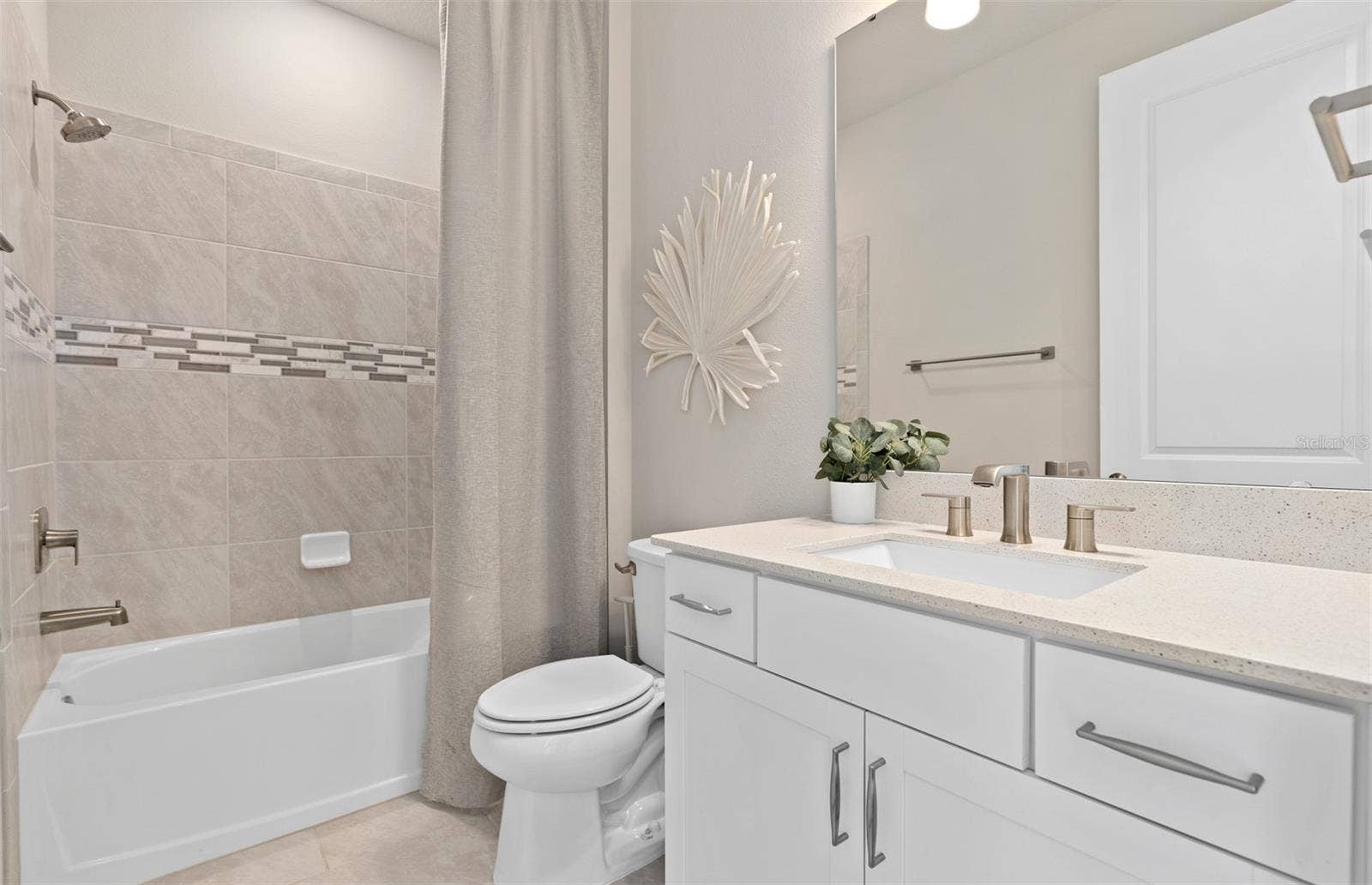 2189 MOSSY VINE AVENUE, St Cloud, FL 34771 Model Home Design Only. Pictures and furnishings are for illustrative purposes only. Elevations, colors and options may vary. Furniture is for model home staging only.