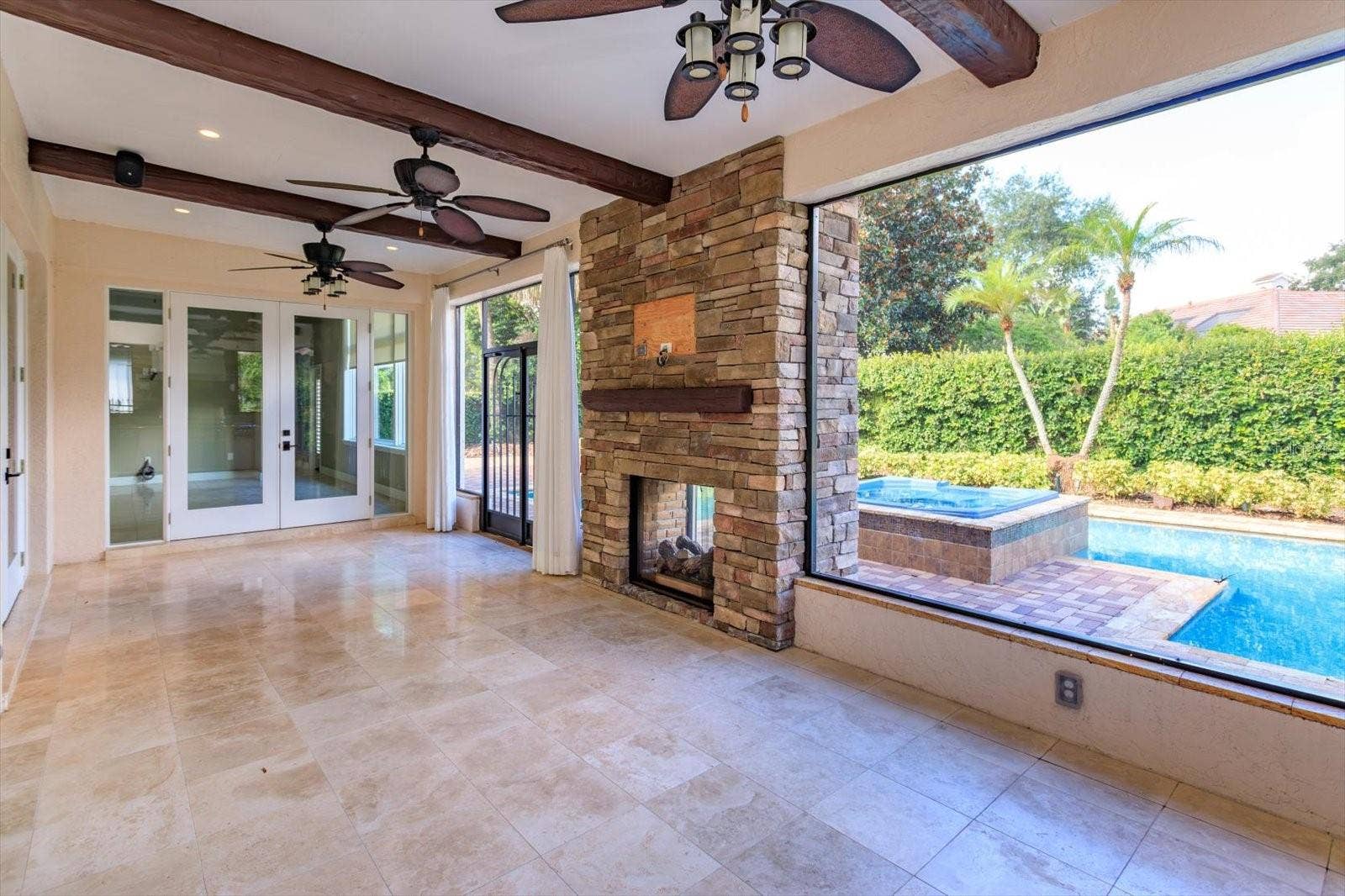 6126 PAYNE STEWART DRIVE, Windermere, FL 34786 See through Patio Fireplace