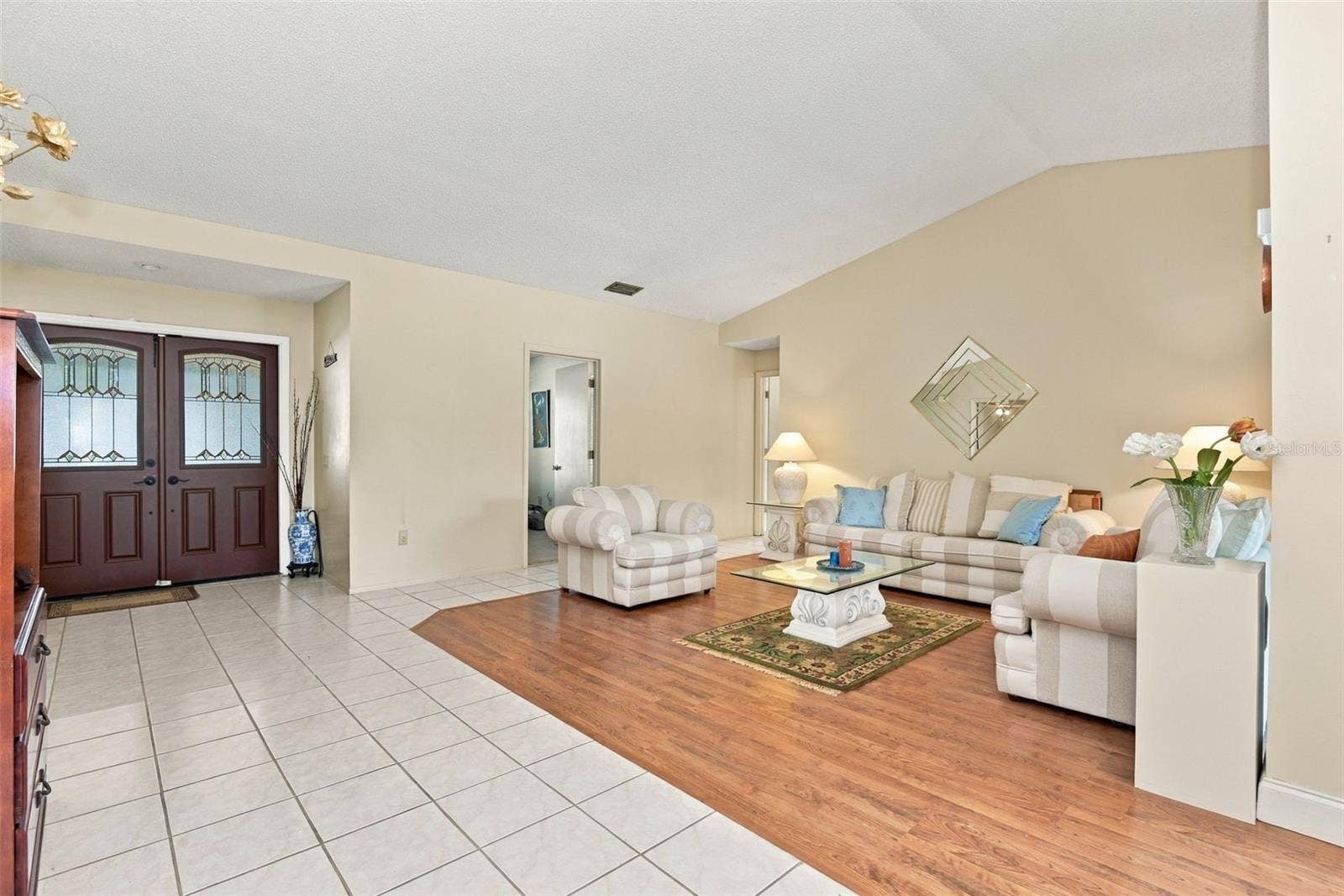 7201 MOSS LEAF LANE, Orlando, FL 32819 Foyer and Formal Living Room