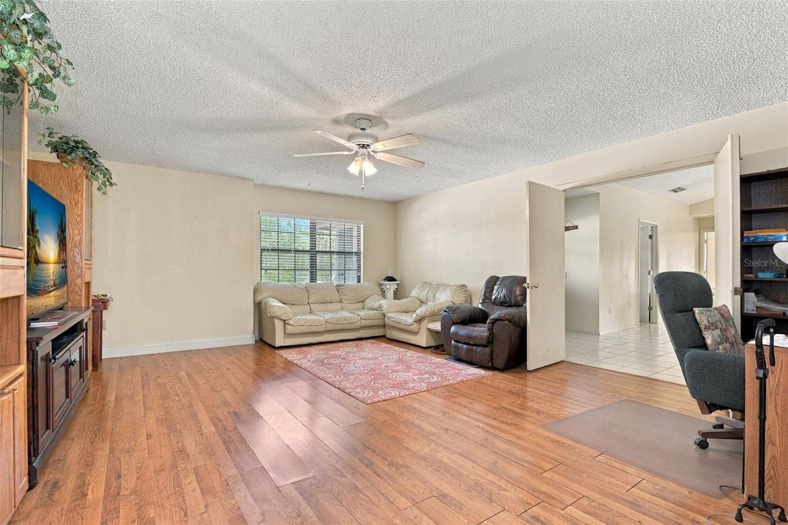 7201 MOSS LEAF LANE, Orlando, FL 32819 Family Room 2