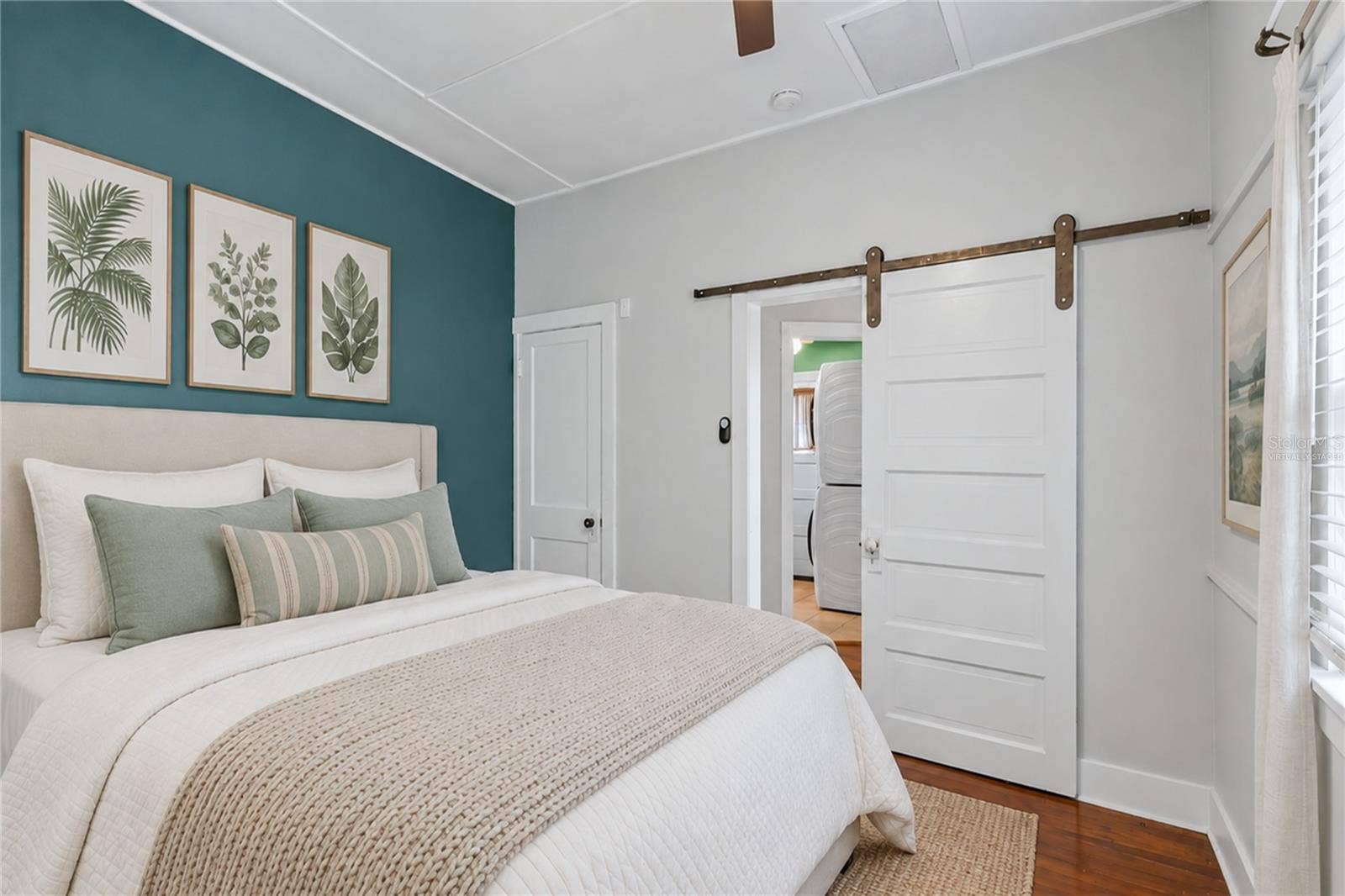 12 N FOREST AVENUE, Orlando, FL 32803 Virtually staged image. Primary bedroom.