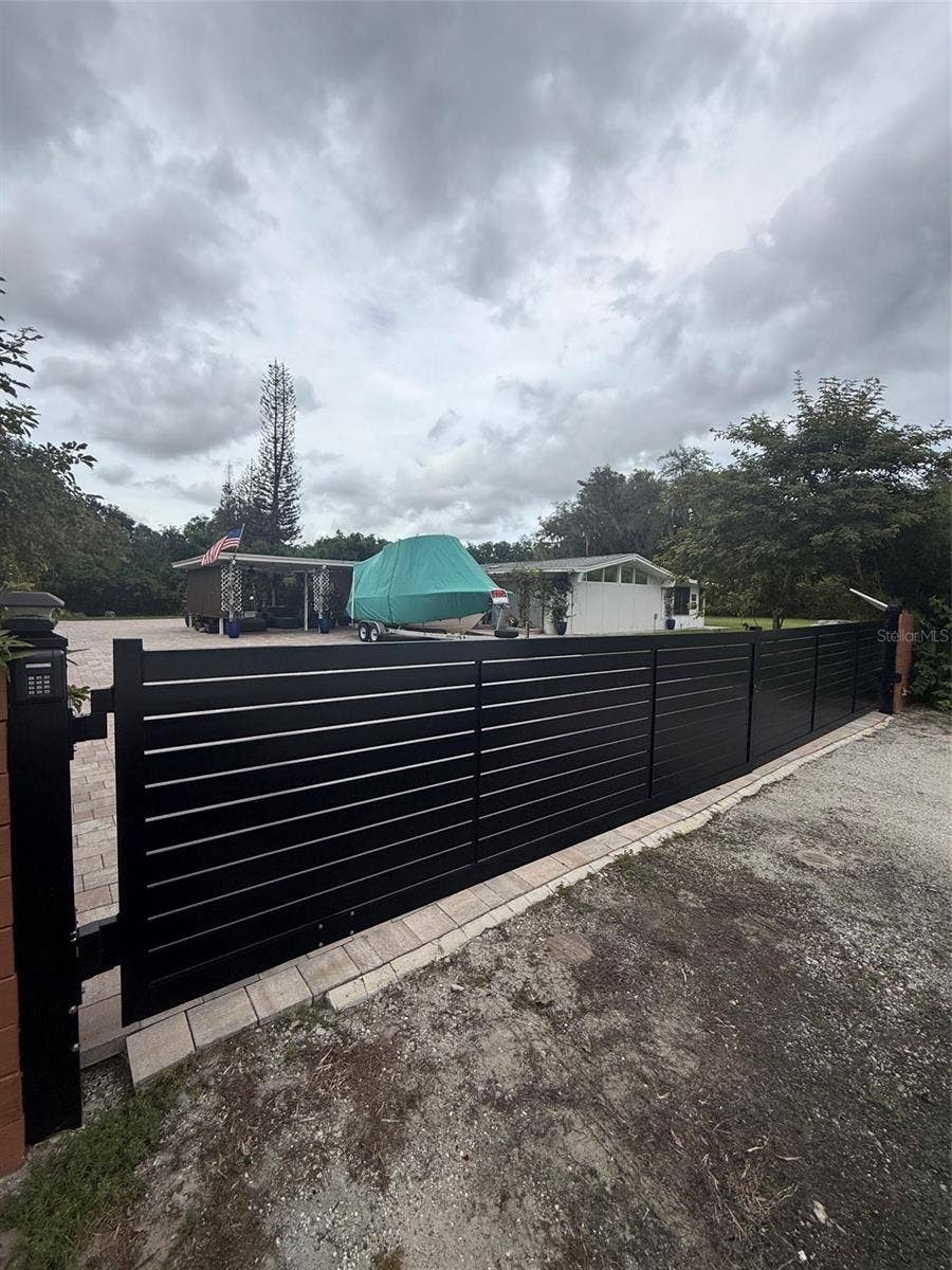 2207 POINSETTIA LANE, Deland, FL 32724 closed gate